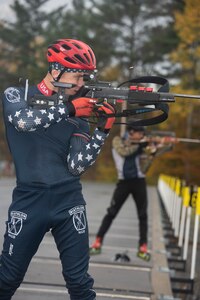 Spc. Vaclav Cervenka, a carpentry and masonry specialist with Det. 1, Headquarters Company, Garrison Support Command, Vermont Army National Guard, practices firing a Biathlon rifle during practice at the Camp Ethan Allen Training Site in Jericho, Vermont, on Nov. 2, 2021. Cervenka is on Team USA's 2021-2022 X Team. (U.S. Army National Guard photo by Don Branum)