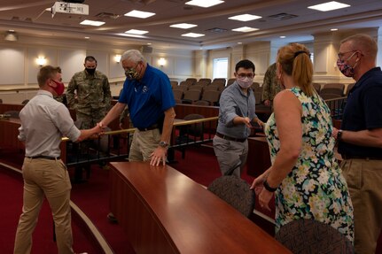 Cadet Ethan Pulkit swears into the Virginia Army National Guard in front of family, friends and peers during a ceremony held Aug. 20, 2021, at Christopher Newport University McMurran Hall, Newport News, Virginia. With more than 200 years of combined family service in the National Guard, Pulket will be following in his family's footsteps and be part of the 4th generation to continue the legacy of military service to the nation and the 29th ID. (U.S. Army National Guard photo by Staff Sgt. Lisa M. Sadler)