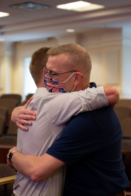 Cadet Ethan Pulkit swears into the Virginia Army National Guard in front of family, friends and peers during a ceremony held Aug. 20, 2021, at Christopher Newport University McMurran Hall, Newport News, Virginia. With more than 200 years of combined family service in the National Guard, Pulket will be following in his family's footsteps and be part of the 4th generation to continue the legacy of military service to the nation and the 29th ID. (U.S. Army National Guard photo by Staff Sgt. Lisa M. Sadler)