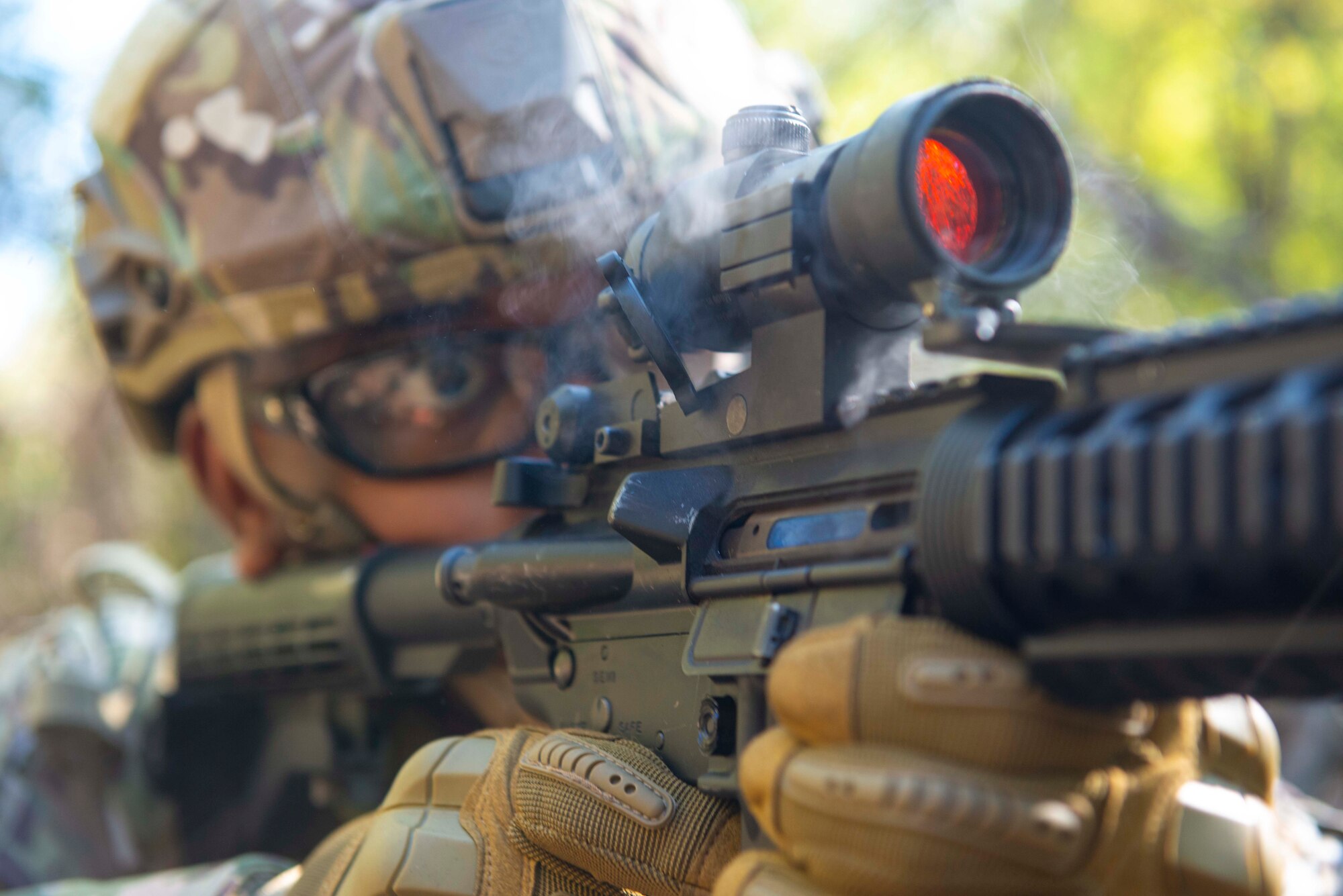 Tech. Sgt. Charles Foster, 934th Aeromedical Staging Squadron section chief of medical records, engages multiple targets with his M4 carbine during a shoot, move and communicate exercise on Oct. 15, 2021 at the Minneapolis-St. Paul Air Reserve Station, Minn. Airmen were placed in two-person teams with 934th Security Forces Squadron Defenders coaching them through failure drills and on how to effectively operate in an austere environment. (U.S. Air Force photo by Chris Farley)