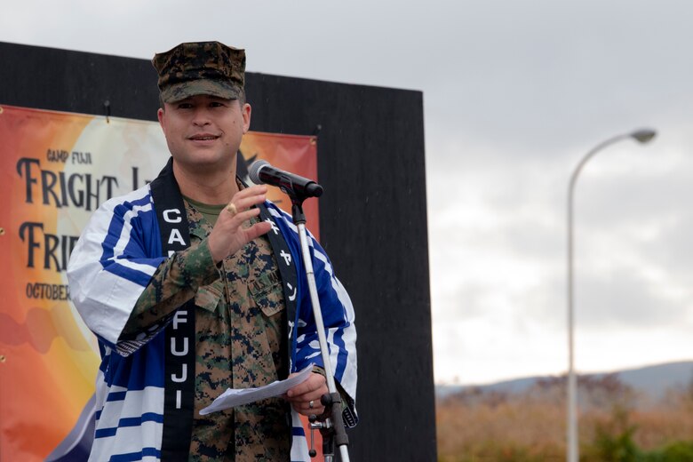 U.S. Marine Corps Col. Robert Bodisch, installation commanding officer, gives his opening remarks at the Fuji Friendship Festival, Combined Arms Training Center Camp Fuji, Shizuoka, Japan, Oct. 31, 2021. Festival attendees were able to view static displays, listen to live entertainment, and interact with U.S. and Japan Self-Defense Force personnel. (U.S. Marine Corps photo by Katie Gray)
