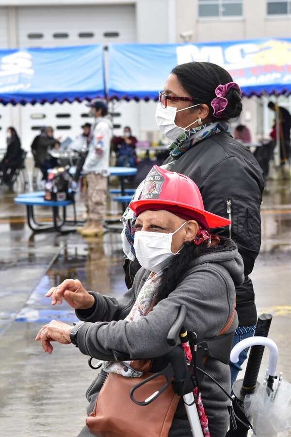 Fuji Friendship Festival attendees enjoy live entertainment during the Halloween-themed event, Combined Arms Training Center Camp Fuji, Shizuoka, Japan, Oct. 31, 2021. Festival attendees were able to view static displays, listen to live entertainment, and interact with U.S. and Japan Self-Defense Force personnel. (U.S. Marine Corps photo by Katie Gray)