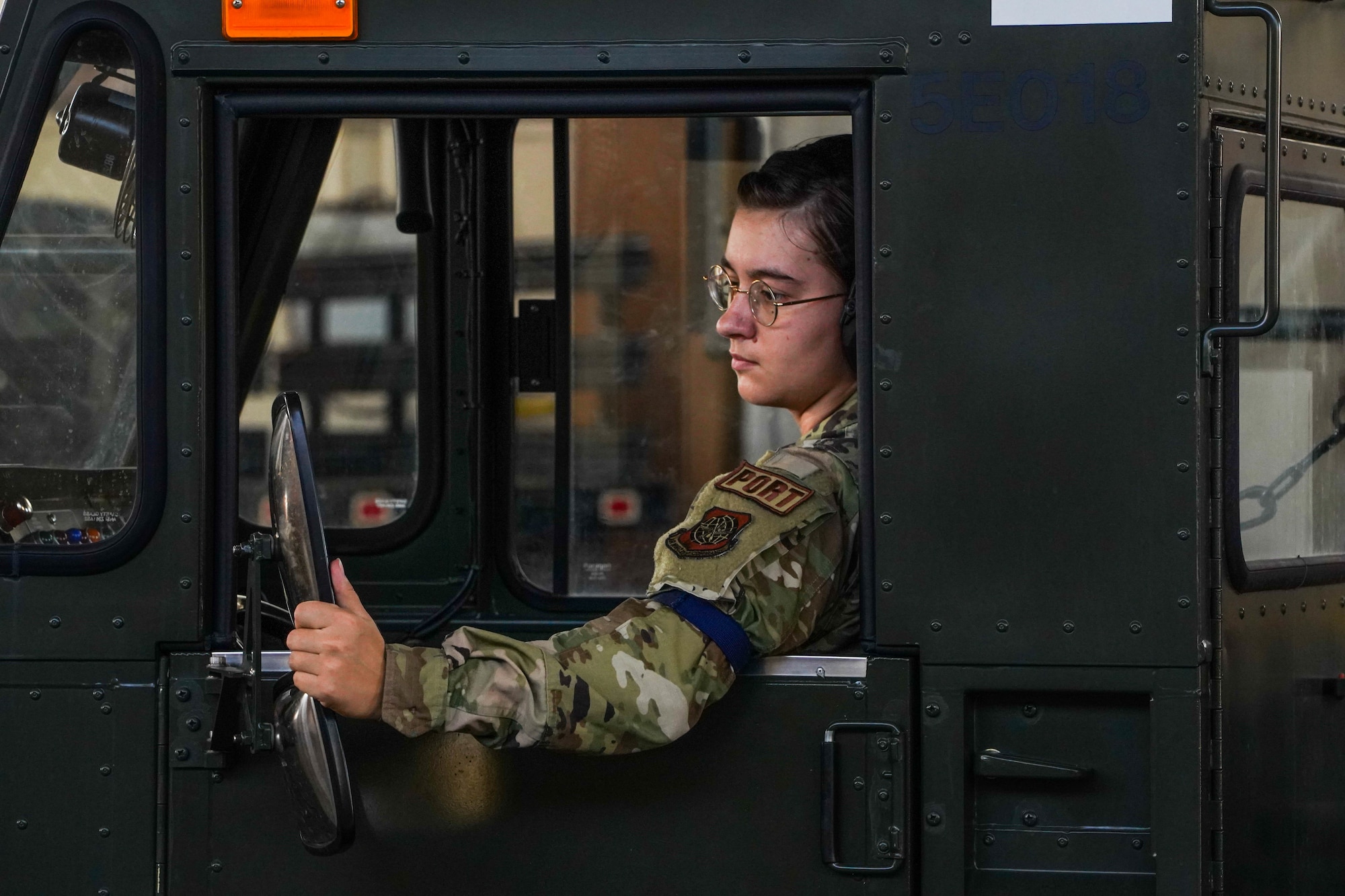 Airman 1st Class Michelle Jenkins, 73th Air Mobility Squadron air freight journeyman, drives a K-loader trailer containing life saving equipment to support the NASA Human Space Flight Crew 2 return and Space Flight Crew 3 launch if required at Joint Base Pearl Harbor-Hickam, Hawaii, Oct. 29, 2021. The 647th LRS supported the NASA Human Space Flight and the 45th Operations Group by uploading emergency rescue equipment needed during launch, flight and landing operations. (U.S. Air Force photo by Airman 1st Class Makensie Cooper)