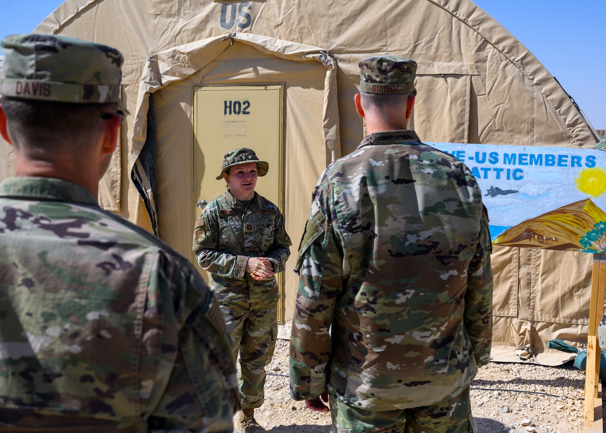 U.S. Air Force Capt. Darby Germain, 378th Air Expeditionary Wing Sexual Assault Response Coordinator, tells U.S. Air Force Lt. Gen. Greg Guillot, 9th Air Force (Air Forces Central) commander, about the new U.S. Serve-Us Members Attic during his visit to Prince Sultan Air Base, Kingdom of Saudi Arabia, Oct. 31, 2021. Guillot visited several units across PSAB, meeting with various personnel to learn about recent innovation, diversity and expansion efforts on base. (U.S. Air Force photo by Senior Airman Samuel Earick)