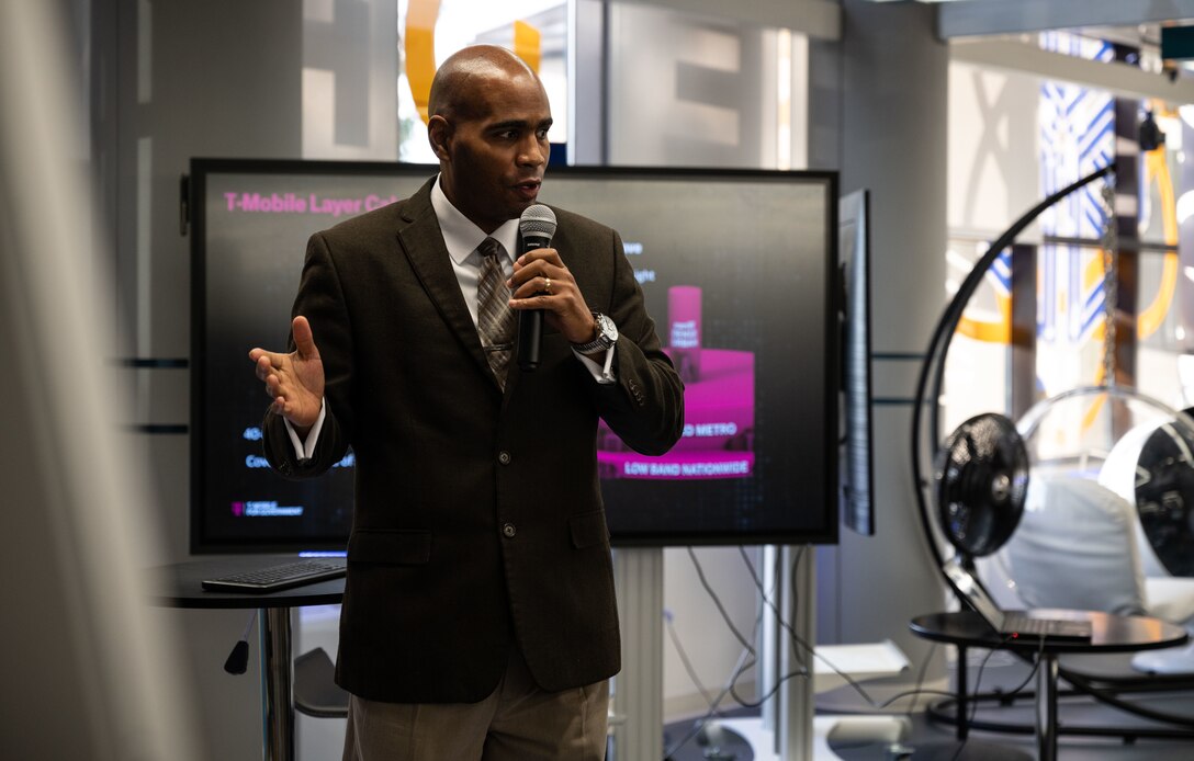 Troy Talbert, T-Mobile client executive, speaks to Airmen at Dover Air Force Base, Delaware, Oct. 20, 2021. The T-Mobile team met with Dover AFB Airmen to discuss new innovative ways to enhance mission effectiveness and accelerate change in meaningful ways. (U.S. Air Force photo by Senior Airman Marco A. Gomez)