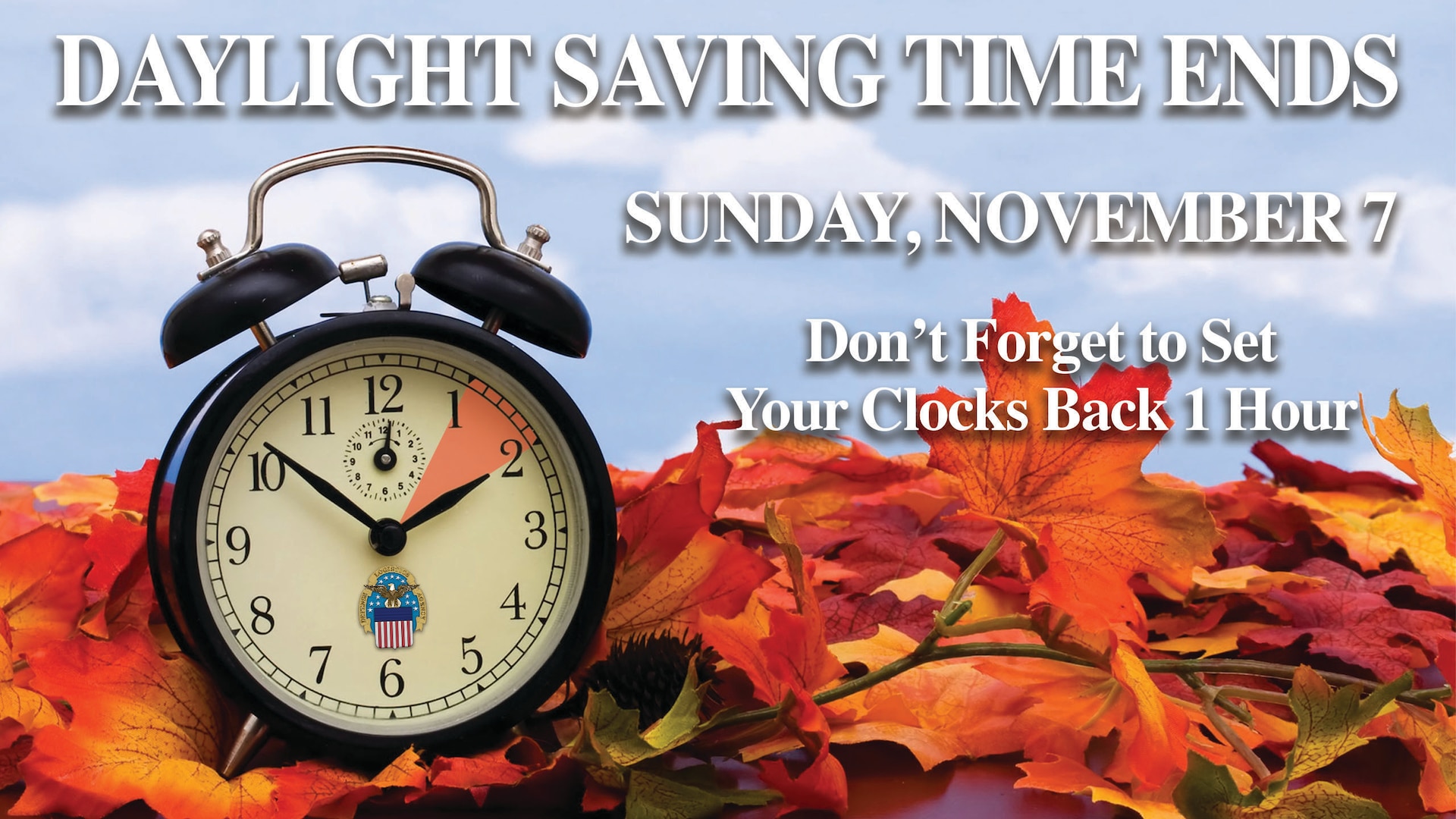 Graphic with clock and fall leaves in the background