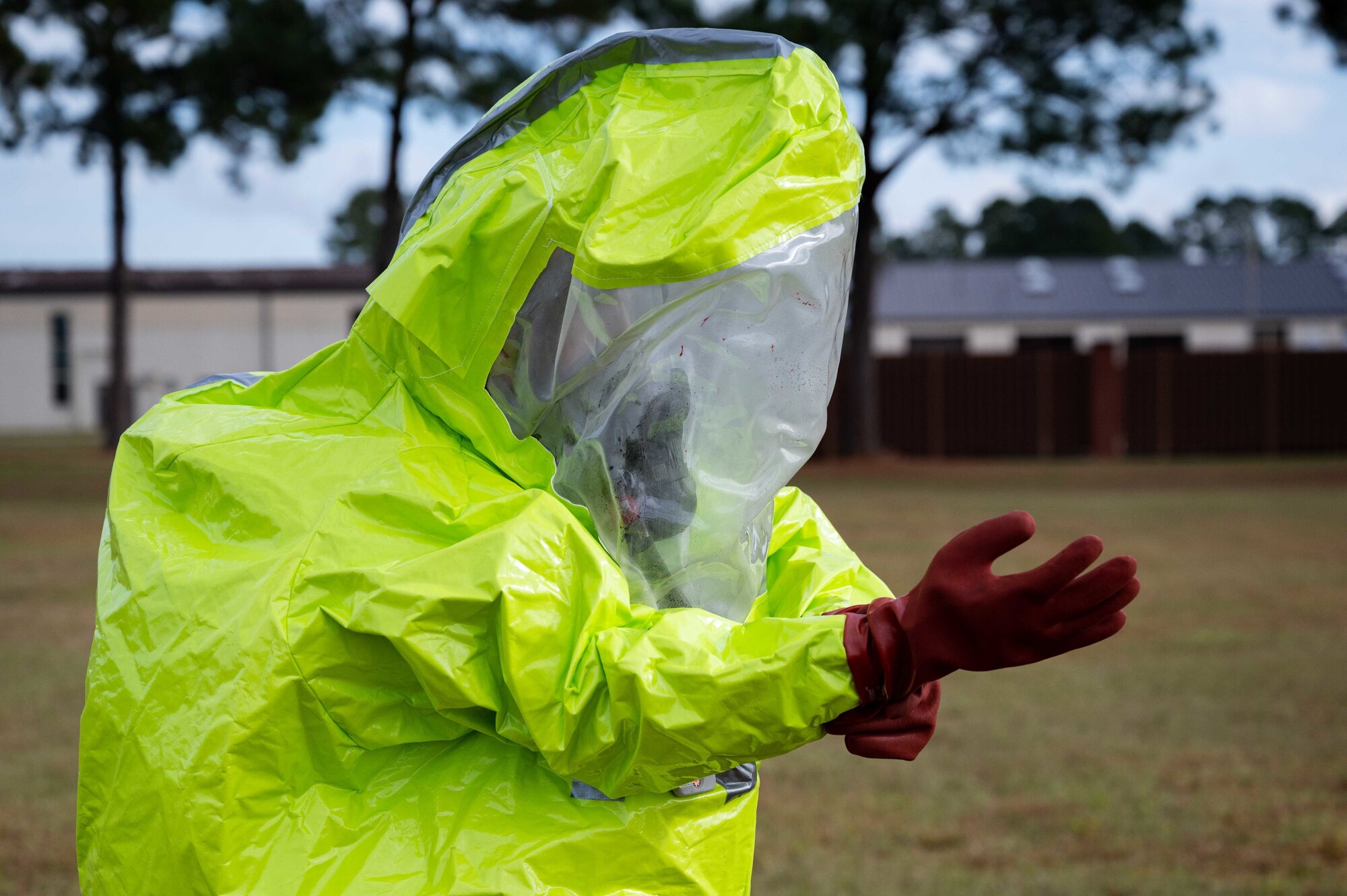 An Airman assigned to the 4th Medical Group practices decontamination procedures as a part of Operation Ready Eagle at Seymour Johnson Air Force Base, North Carolina, Oct. 29, 2021. Operation Ready Eagle focused on decontamination procedures, triage training, and point of dispense training. (U.S. Air Force Photo by Senior Airman David Lynn)