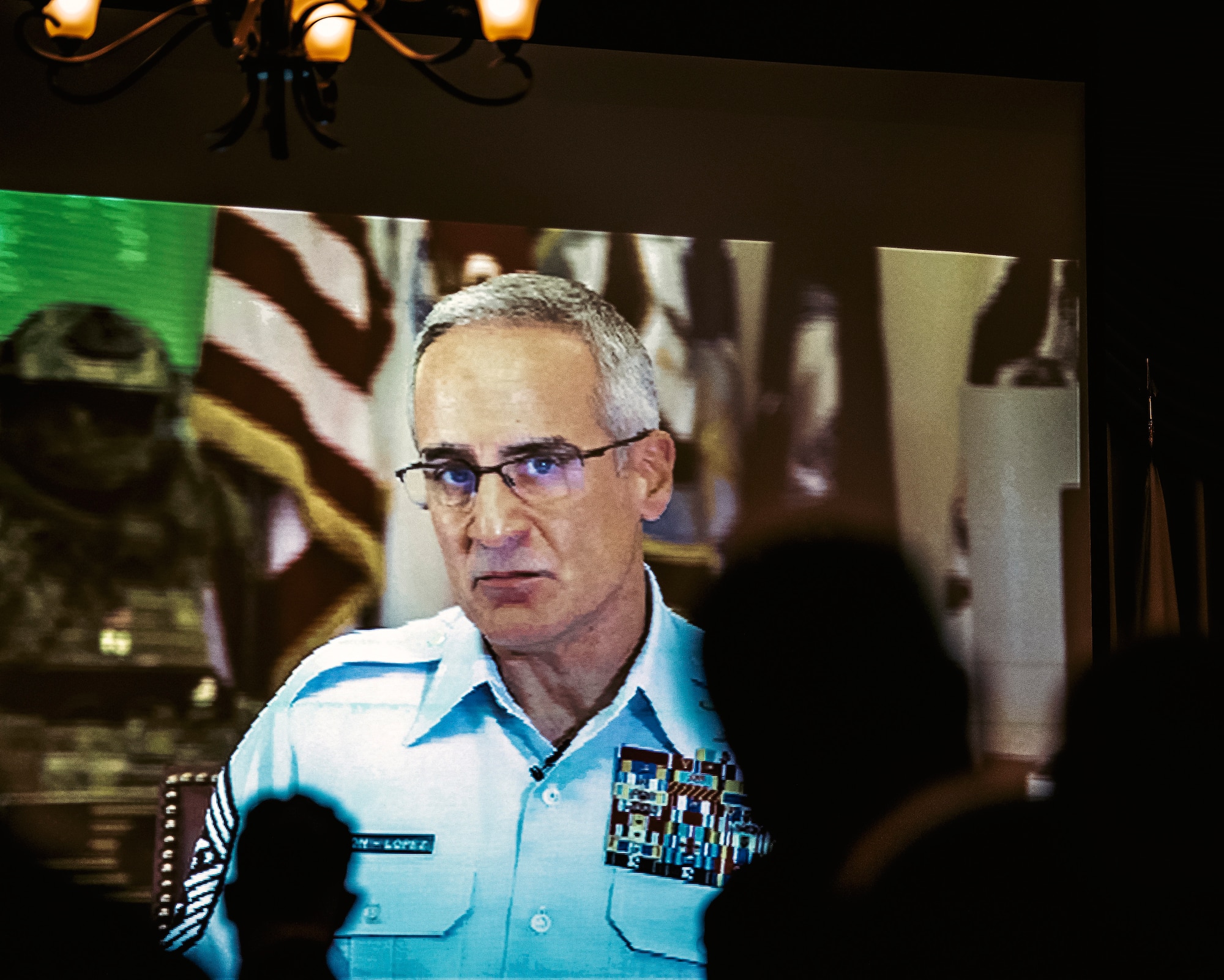 Senior Enlisted Advisor to the Chairman (SEAC) of the Joint Chiefs of Staff, Ramon Colon-Lopez, addresses class 21-G of the Kish Airman Leadership School, through a video message, during their graduation ceremony on Joint Base McGuire-Dix-Lakehurst, N.J., Oct. 21, 2021. With the graduation of class 21-G, The Kish ALS has become the first ALS to graduate a class consisting of students from all six of the uniformed military services. (U.S. Air Force photo by Tech. Sgt. Austin Knox)
