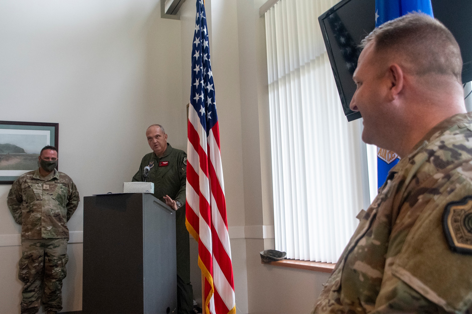 Retired Lt. Col. Ryan Bailey delivers remarks during a retirement ceremony for Col. Michael Belardo Oct. 2, 2021, at Knob Noster, Missouri. Belardo, the 131st Maintenance Group commander, retired from the Missouri Air National Guard after many years of service. (U.S. Air National Guard photo by Staff Sgt. Adrian Brakeley)