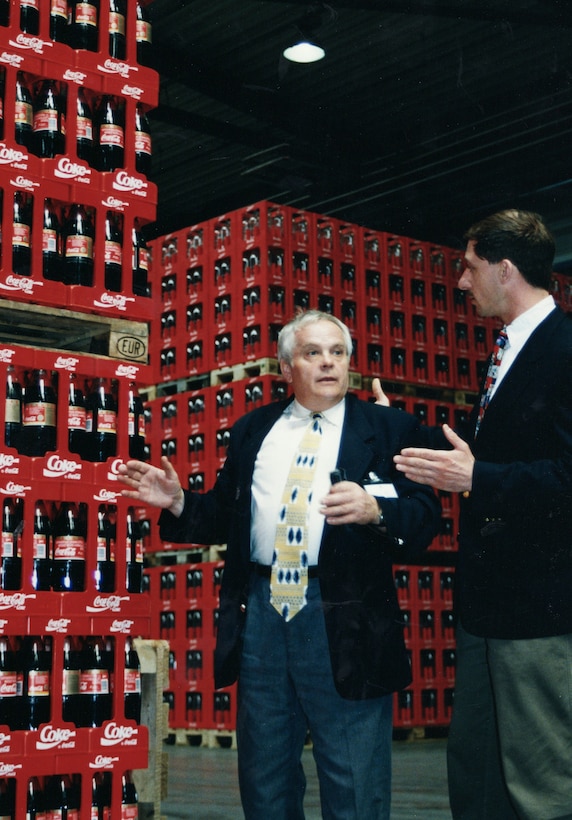 Two men tour a Coca-Cola plant in Budapest, late 1995.