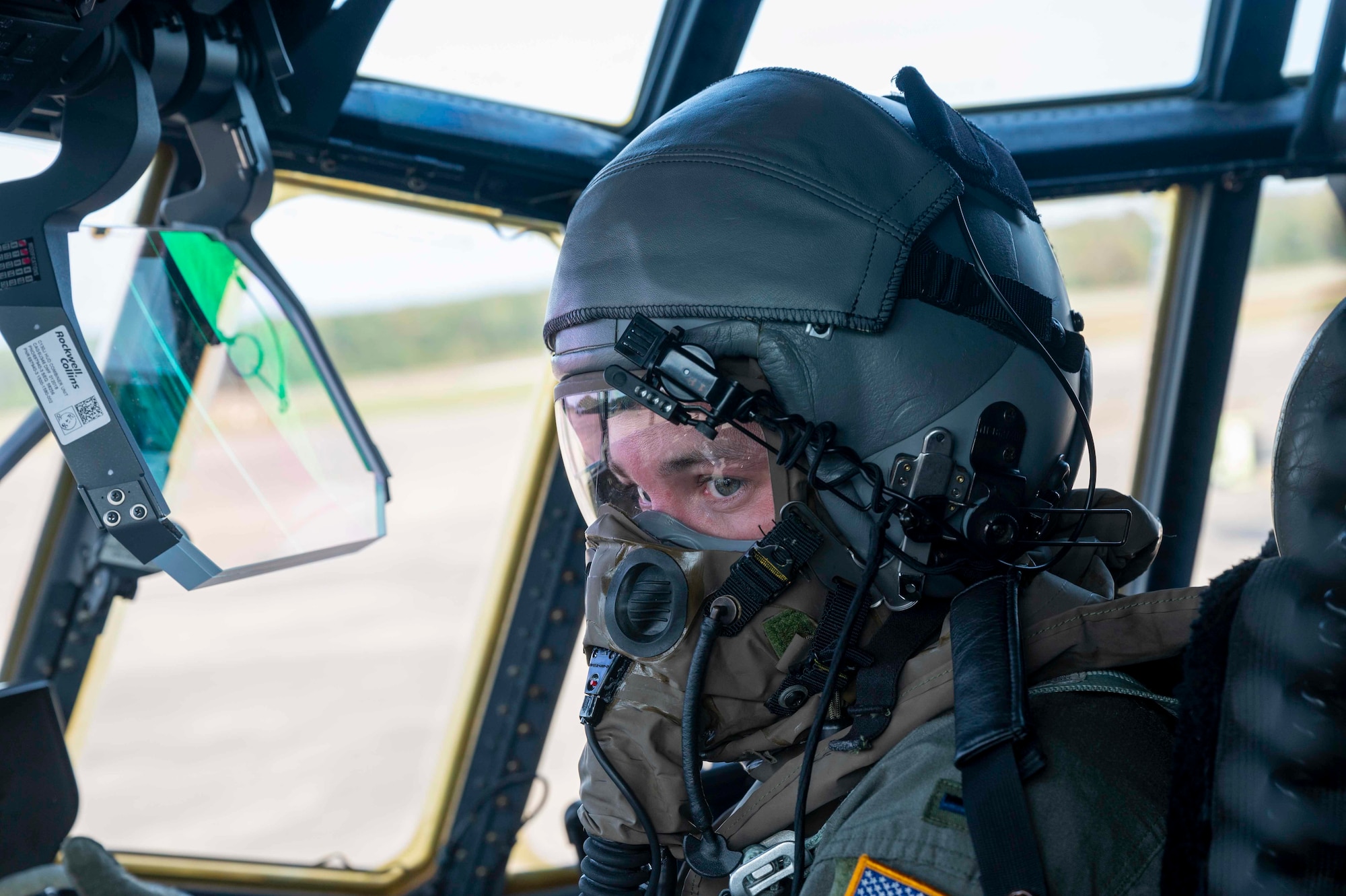 A pilot prepares for takeoff on a C-130.
