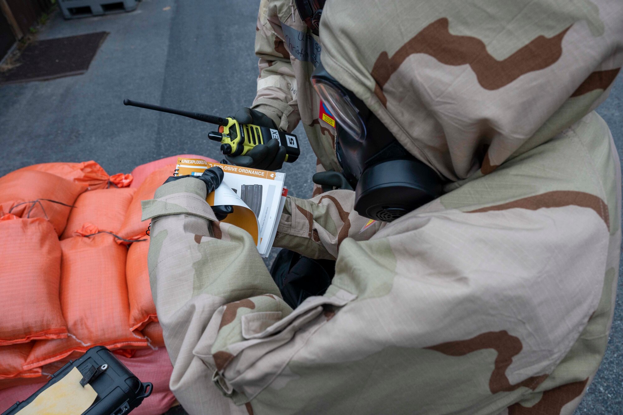 An airman attempts to identify a CBRN contamination.