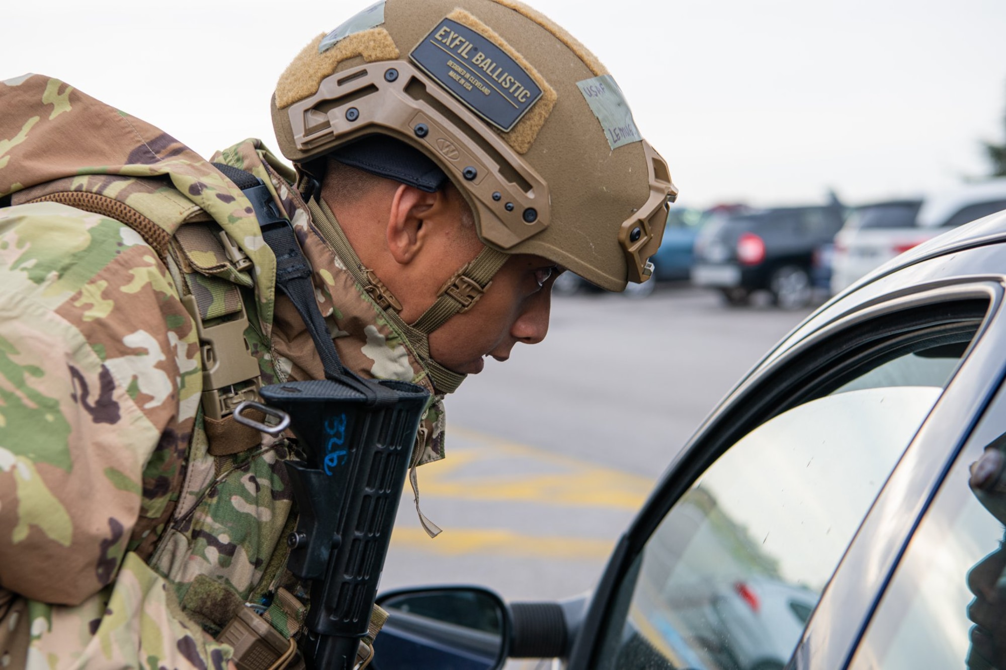 Senior Airman Lemuel Pachicom, 31st Security Forces Squadron response force leader inspects a suspicious vehicle during a base defense exercise at Aviano Air Base, Italy, Nov. 3, 2021. The exercise was designed to test the 31st Fighter Wing’s ability to respond to a variety of potential threats, protect and generate combat airpower, and defend the base. (U.S. Air Force photo by Senior Airman Elijah M. Dority)