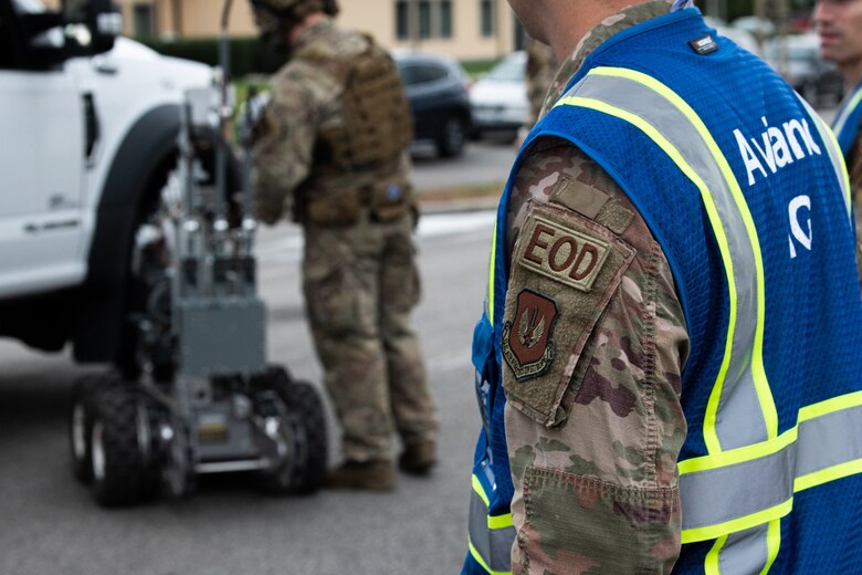 Airmen assigned to the 31st Civil Engineer Squadron Explosive Ordnance Disposal flight send a robot to a suspicious vehicle during a base defense exercise at Aviano Air Base, Italy, Nov. 3, 2021. The exercise was designed to test the 31st Fighter Wing’s ability to respond to a variety of potential threats, protect and generate combat airpower, and defend the base. (U.S. Air Force photo by Senior Airman Elijah M. Dority)
