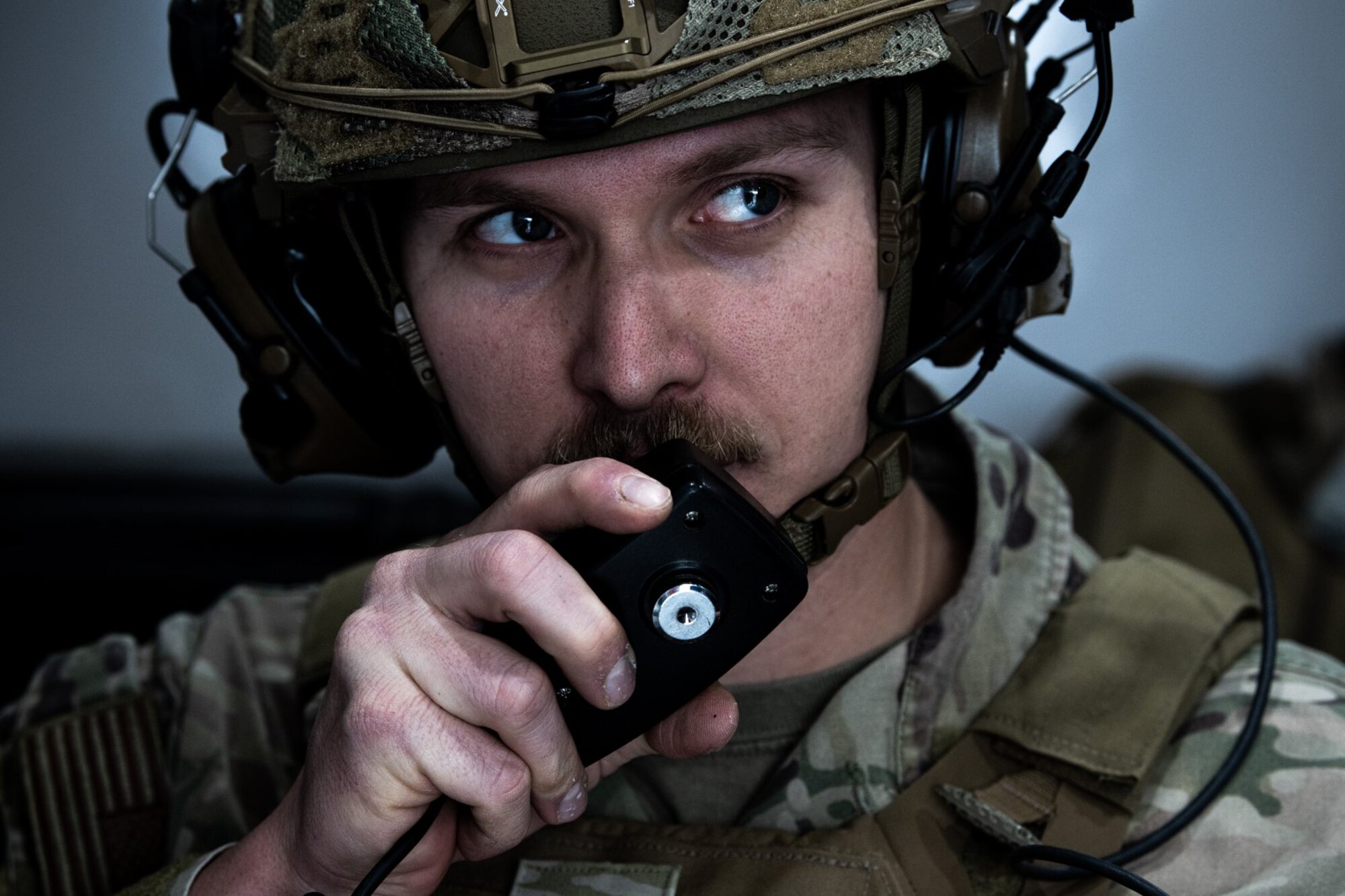 Staff Sgt. Tyler McConnell, 31st Civil Engineer Squadron Explosive Ordnance Disposal flight member, communicates on a radio during a base defense exercise at Aviano Air Base, Italy, Nov. 3, 2021. The exercise was designed to test the 31st Fighter Wing’s ability to respond to a variety of potential threats, protect and generate combat airpower, and defend the base. (U.S. Air Force photo by Senior Airman Elijah M. Dority)