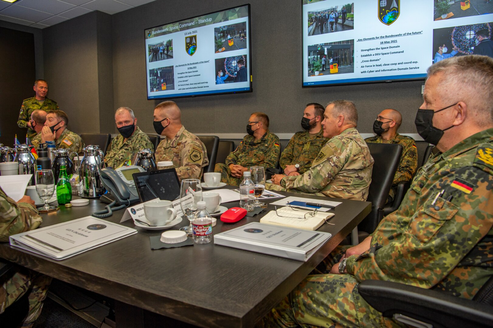 German and American military officials meet.