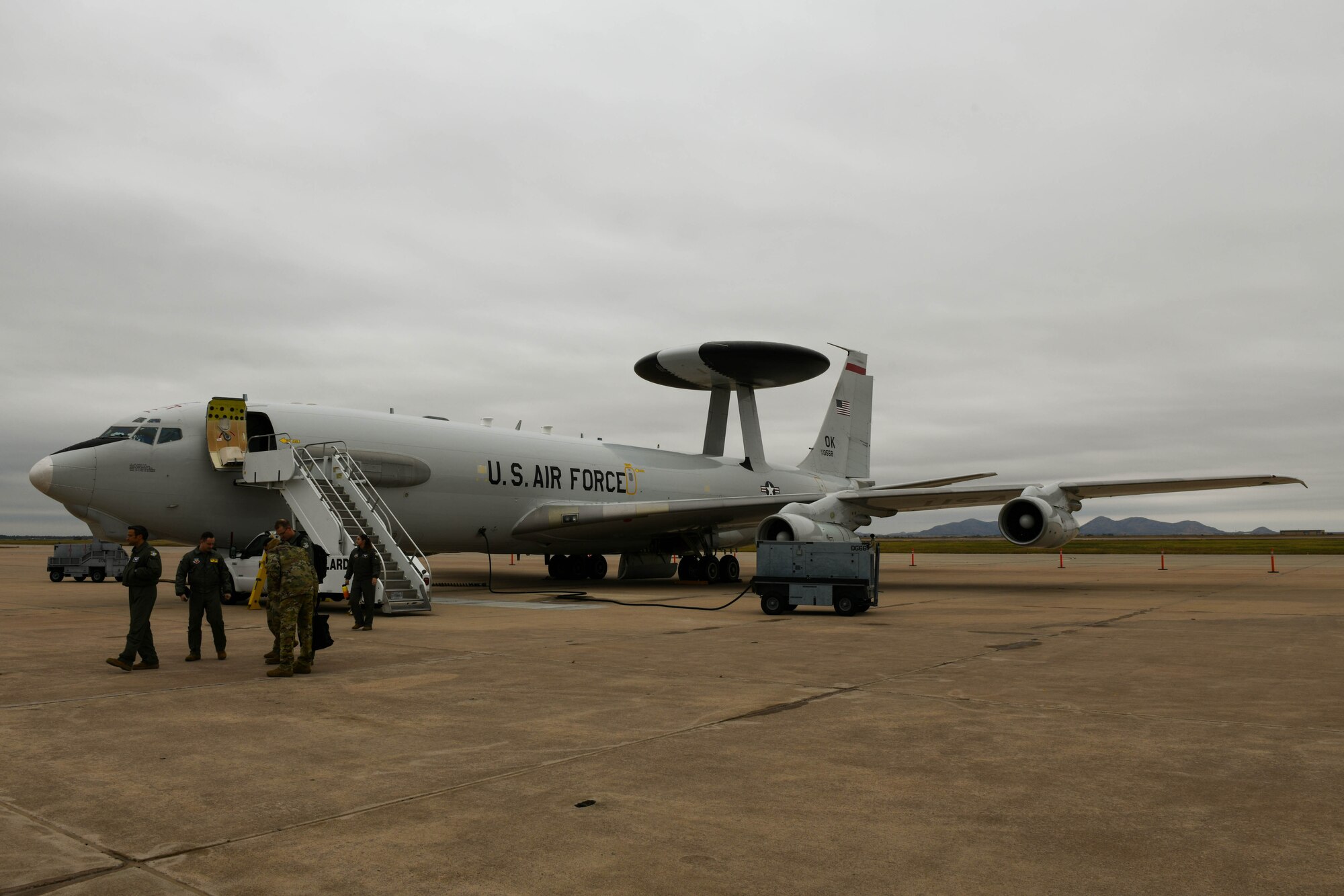 A U.S. Air Force E-3 Sentry Airborne Warning and Control Systems (AWACS) aircraft waits on the flightline at Altus Air Force Base (AFB), Oklahoma, Nov. 2, 2021. The 552nd Operations Group, based out of Tinker AFB, is tasked with the operations, maintenance, logistics, training and combat support of AWACS. (U.S. Air Force photo by Airman 1st Class Trenton Jancze)