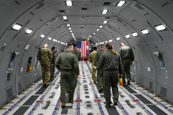 Members from the 552nd Operations Group (OG) tour the cargo area of a KC-46 Pegasus on Altus Air Force Base (AFB), Oklahoma, Nov. 2, 2021. Eight members of the 552nd OG visited Altus AFB for a “crosstalk” and tour of the KC-46. (U.S. Air Force photo by Airman 1st Class Trenton Jancze)