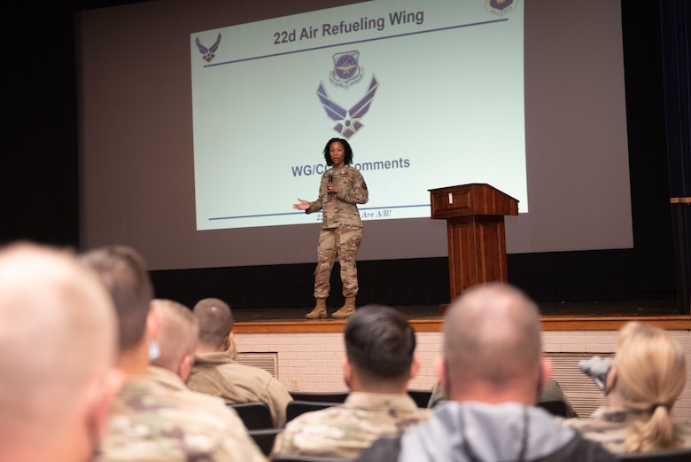 Chief Master Sergeant Melissa H. Royster, 22nd Air Refueling Wing command chief, speaks to members of the enlisted force, officers and civilians during an all call at the McConnell base theater, Nov. 04, 2021.Chief Royster explained the importance of every Airmen’s role at the Wing and how it contributes to working at a faster pace for the Wing. (U.S. Air Force photo by SSgt Adam Goodly)