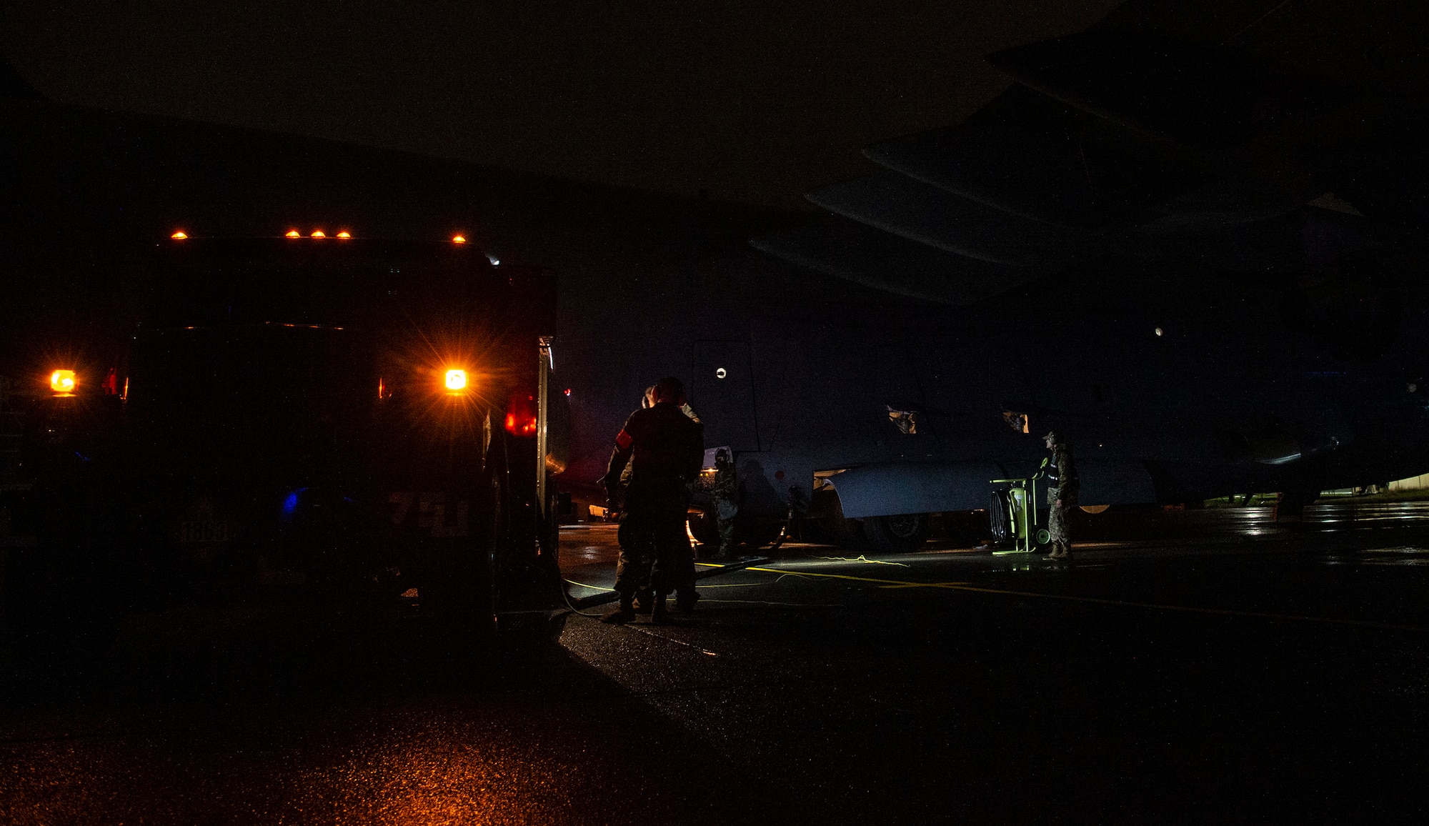 62nd Airlift Wing Airmen refuel a C-17 Globemaster III during Exercise Rainier War 21B at Joint Base Lewis-McChord, Washington, Nov. 3, 2021. The exercise is designed to demonstrate the wing’s ability to operate and survive while defeating challenges to the U.S. military advantage in all operating domains – air, land, sea and cyberspace. (U.S. Air Force photo by Staff Sgt. Tryphena Mayhugh)