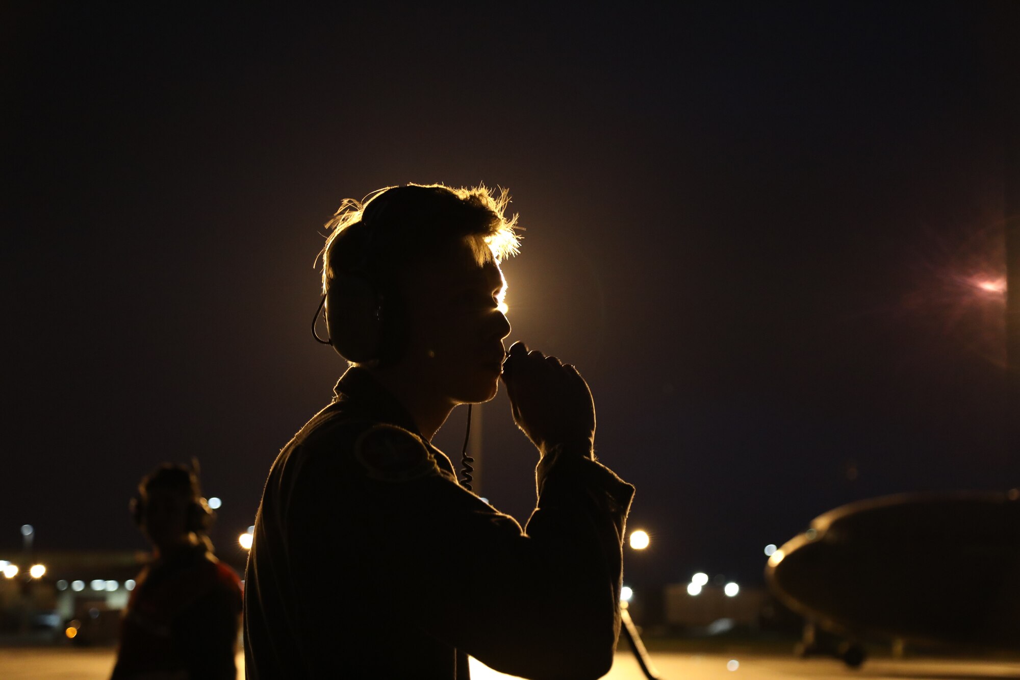 U.S. Air Force Senior Airman Jacob Kyle, 7th Airlift Squadron loadmaster, performs outside aircraft pre-flight checks on a C-17 Globemaster III during Exercise Rainier War 21B at Joint Base Lewis-McChord, Washington, Nov.  3, 2021. Rainier War is a semi-annual, large readiness exercise led by 62nd Airlift Wing, designed to train Airmen under realistic scenarios that support a full spectrum readiness operations against modern threats and replicate today’s contingency operations. (U.S. Air Force photo by Senior Airman Christopher Sommers)
