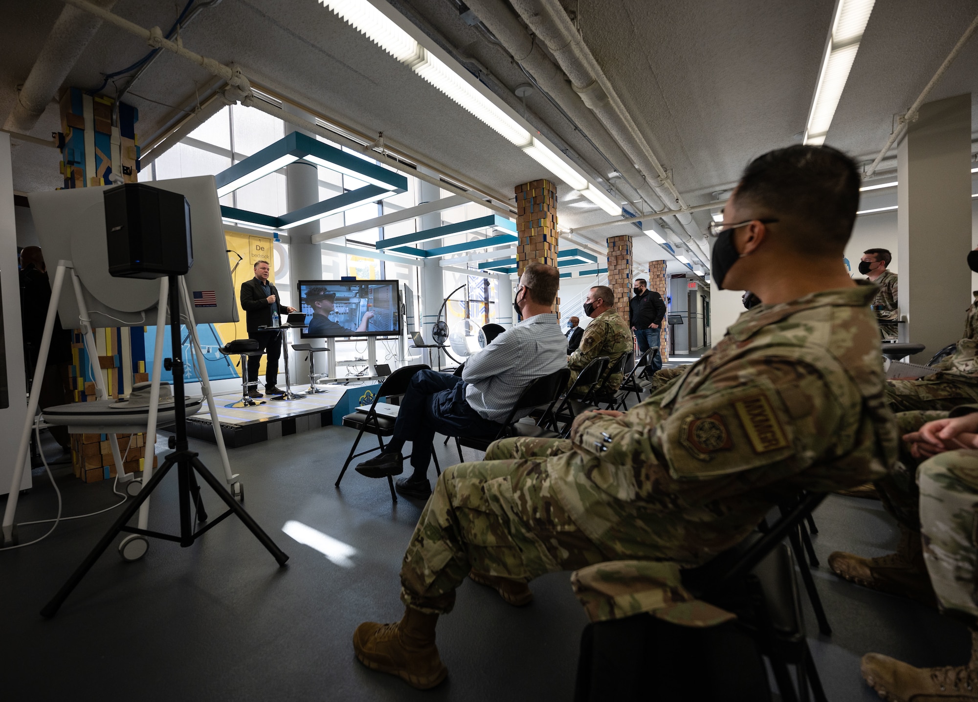 Kelly Malone, T-Mobile partner and Taqtile representative, speaks to Airmen at Dover Air Force Base, Delaware, Oct. 20, 2021. The T-Mobile team met with Dover AFB Airmen to discuss new innovative ways to enhance mission effectiveness and accelerate change in meaningful ways. (U.S. Air Force photo by Senior Airman Marco A. Gomez)