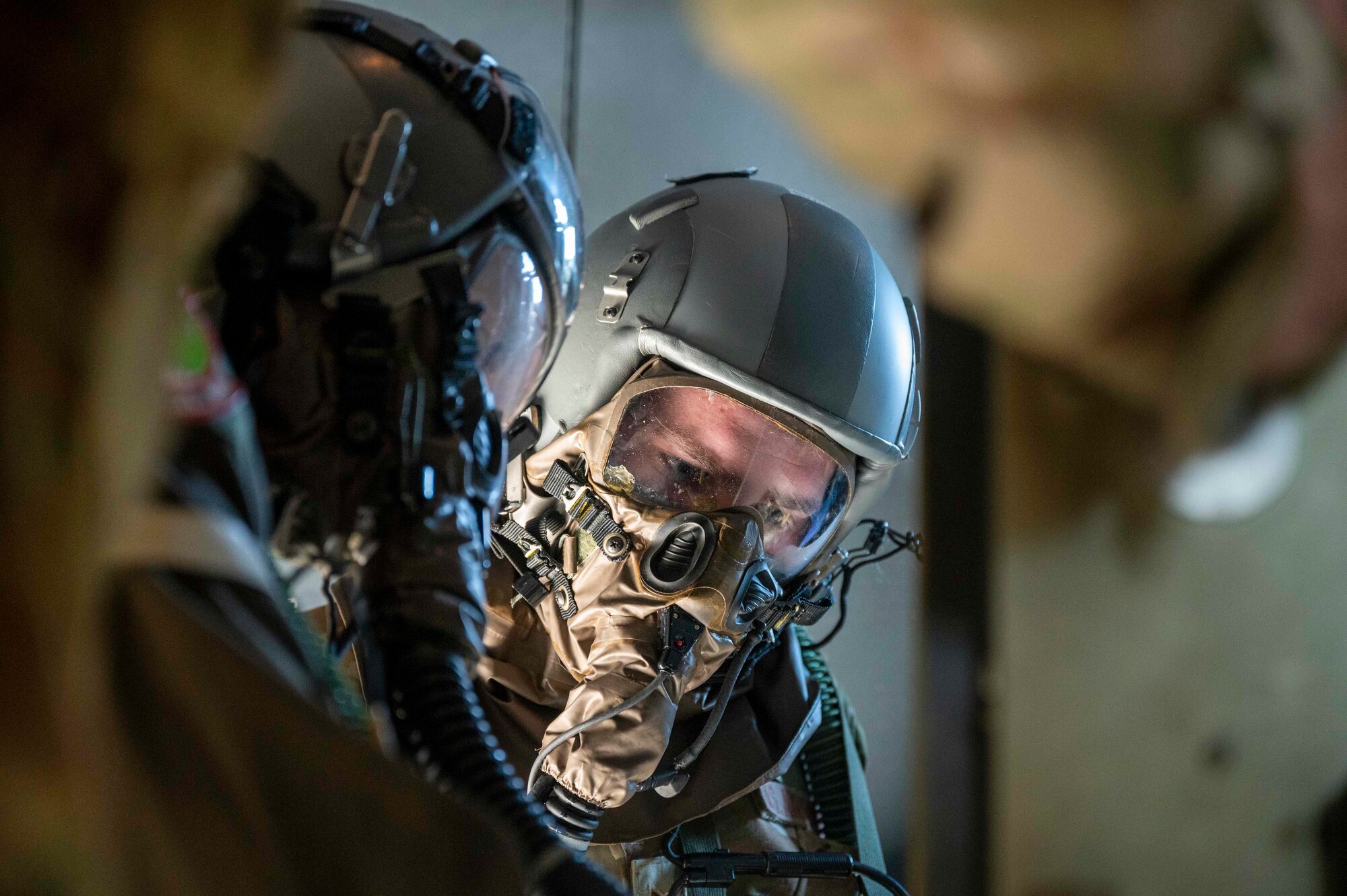 Aircrew conduct a pre-flight check during an exercise.