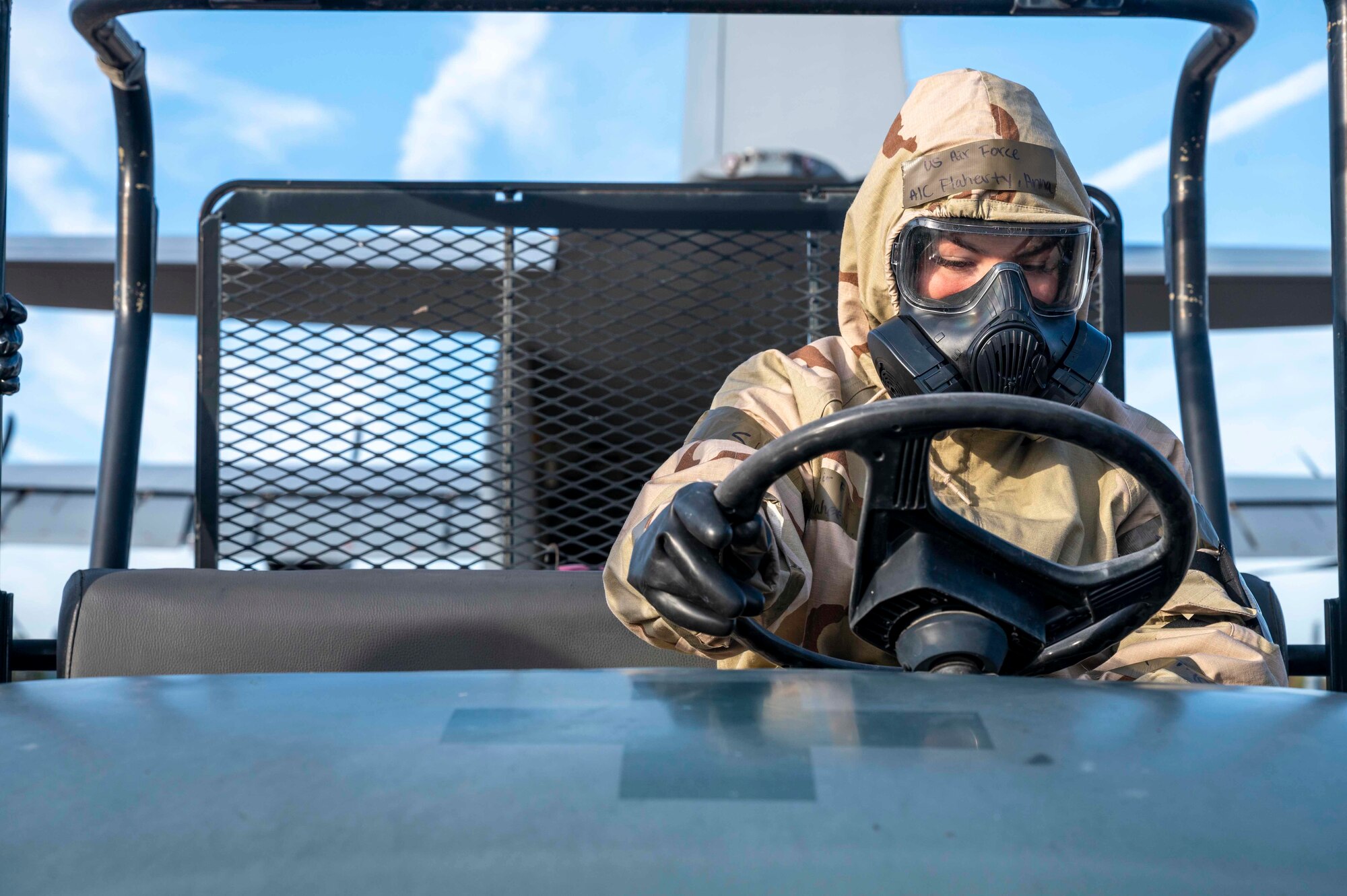 An Airman starts a MULE before loading it onto a C-130J.