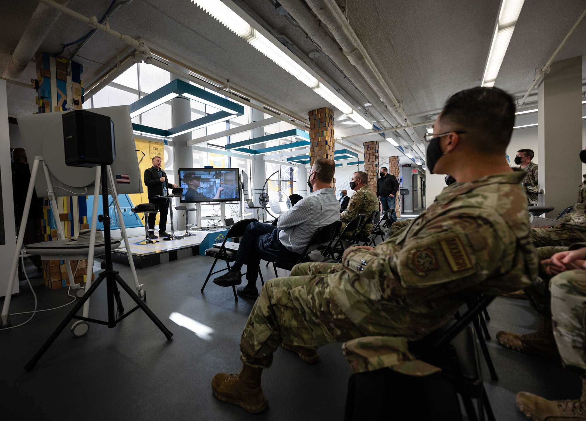 Kelly Malone, T-Mobile partner and Taqtile representative, speaks to Airmen at Dover Air Force Base, Delaware, Oct. 20, 2021. The T-Mobile team met with Dover AFB Airmen to discuss new innovative ways to enhance mission effectiveness and accelerate change in meaningful ways. (U.S. Air Force photo by Senior Airman Marco A. Gomez)