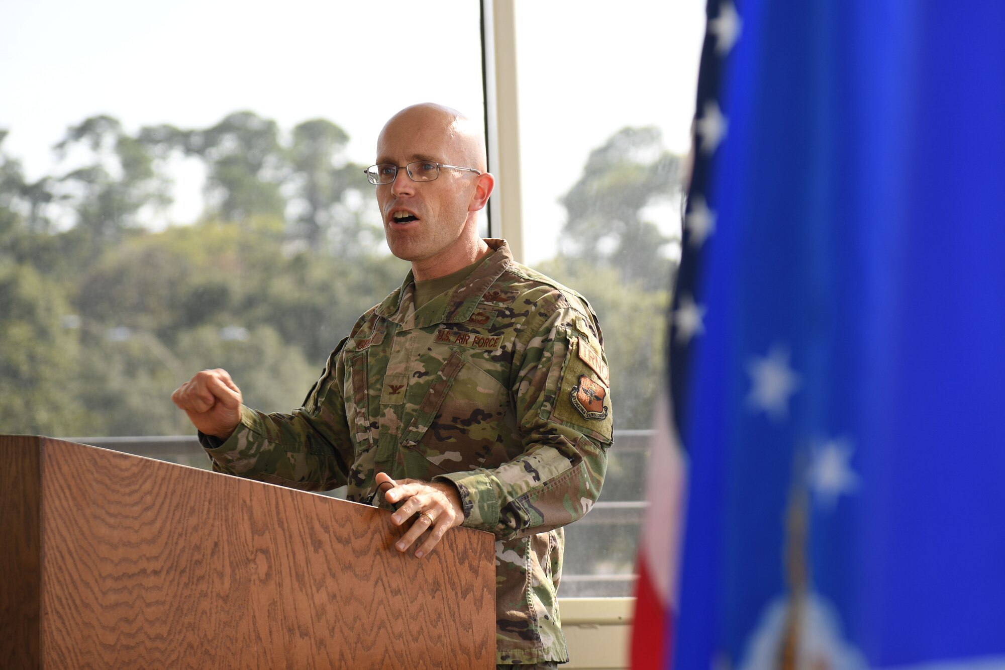 U.S. Air Force Col. Chance Geray, 81st Training Group commander, delivers remarks during the Space Weather Support Course ribbon cutting ceremony inside the Weather Training Complex at Keesler Air Force Base, Mississippi, Nov. 3, 2021. The course will apply knowledge of the effects of the natural environment on space systems and also space weather effects on terrestrial systems in support of multi-domain operations. (U.S. Air Force photo by Kemberly Groue)