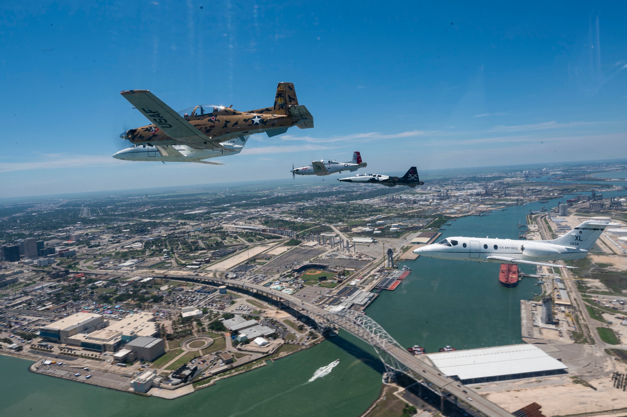A six-ship dissimilar formation consisting of two T-1A Jayhawks, two T-38 Talons, and two T-6A Texan II aircrafts from Laughlin Air Force Base, Texas, practice advanced maneuvering May, 2, 2021. Instructor pilots from the 434th, 87th and 85th Flying Training Squadrons demonstrated the flying proficiency all Air Force student pilots receive during their 52-week Specialized Undergraduate Pilot Training, before being assigned to their operational career airframe. (U.S. Air Force photo by Airman 1st Class David Phaff)