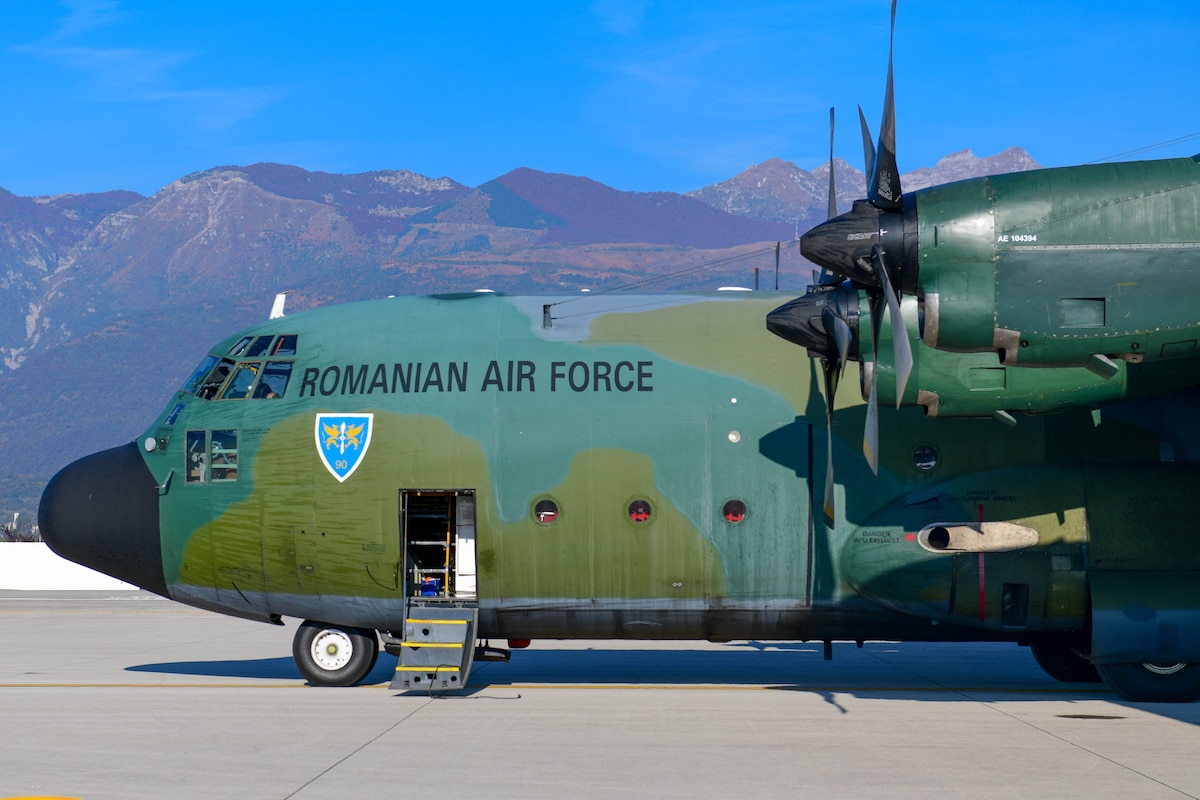 A Romanian air force C-130 sits on the flight line at Aviano Air Base, Italy, Oct. 29, 2021. The C-130 was loaded with critical cargo for U.S. Air Force F-16C Fighting Falcons assigned to the 31st Fighter Wing participating in an exercise within the larger Castle Forge operation at Campia Turzii, Romania. F-16s, support equipment and Airmen assigned to the 31st Fighter Wing at Aviano Air Base, Italy participated in the exercise that tested a number of objectives include the ability to rapidly disperse combat airpower. (U.S. Air Force photo by Senior Airman Brooke Moeder)