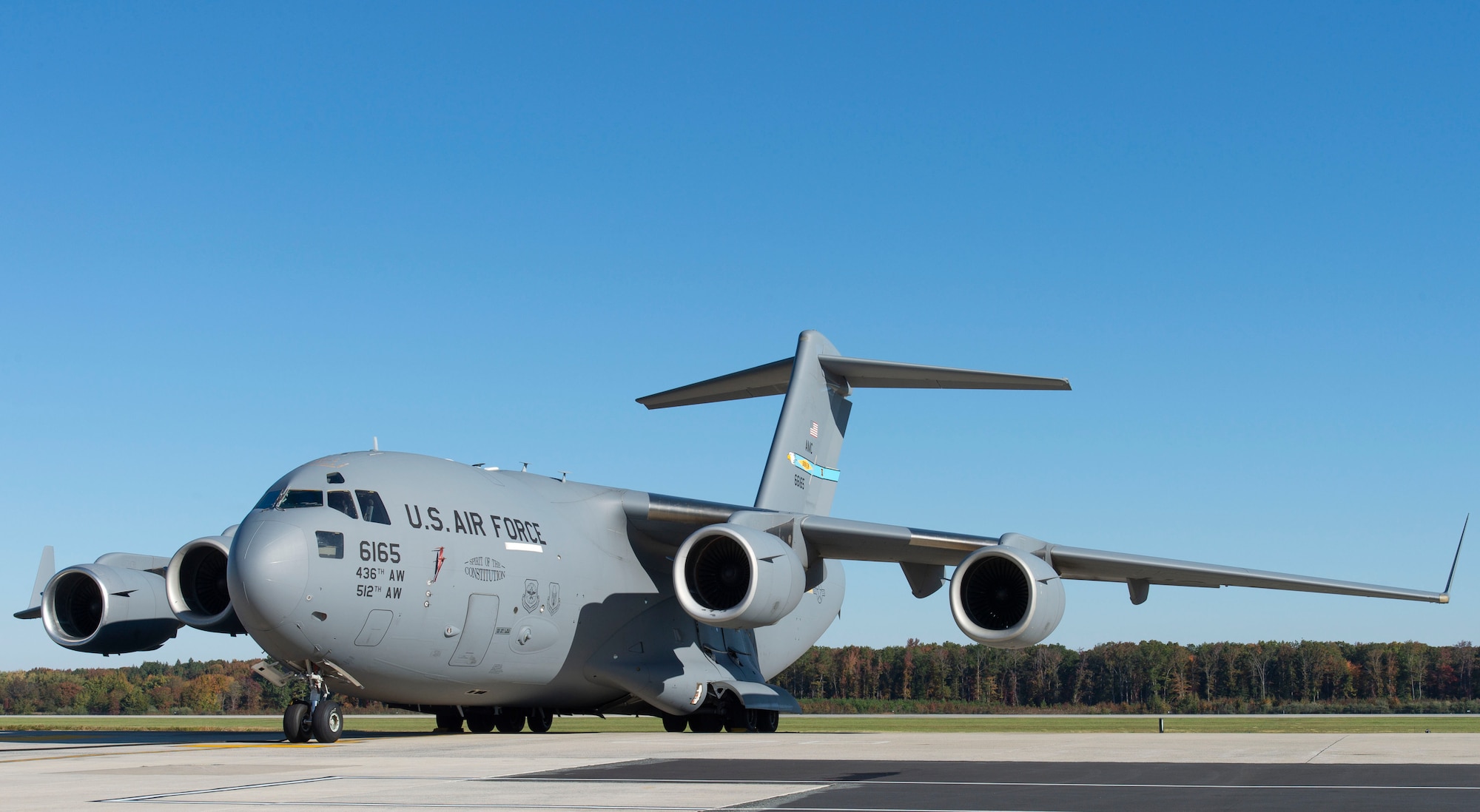 A C-17 Globemaster III sits on the flight line at Dover Air Force Base, Delaware, Nov. 3, 2021. During Operation Allies Refuge, 3rd Airlift Squadron aircrew members flew 68 missions, evacuating 7,700 people and more than 3.5 million pounds of cargo and passengers. (U.S. Air Force photo by Roland Balik)