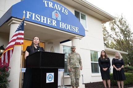 staff gives speech during grand re-opening of Fisher House