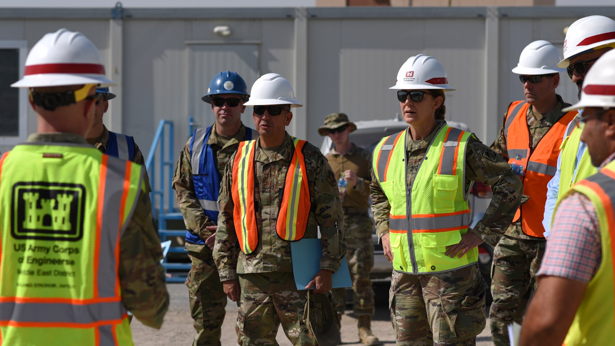 U.S. Army Maj. Gen. Kimberly Colloton, commanding general of the U.S. Army Corps of Engineers Transatlantic Division, speaks with Ali Al Salem Air Base leadership and USACE regarding the construction of the new dining facility on ASAB, Kuwait, Oct. 21, 2021. A priority of the 386th Air Expeditionary Wing is to improve its installations and the quality of life of its Airmen. (U.S. Air Force photo by Staff Sgt. Ryan Brooks)