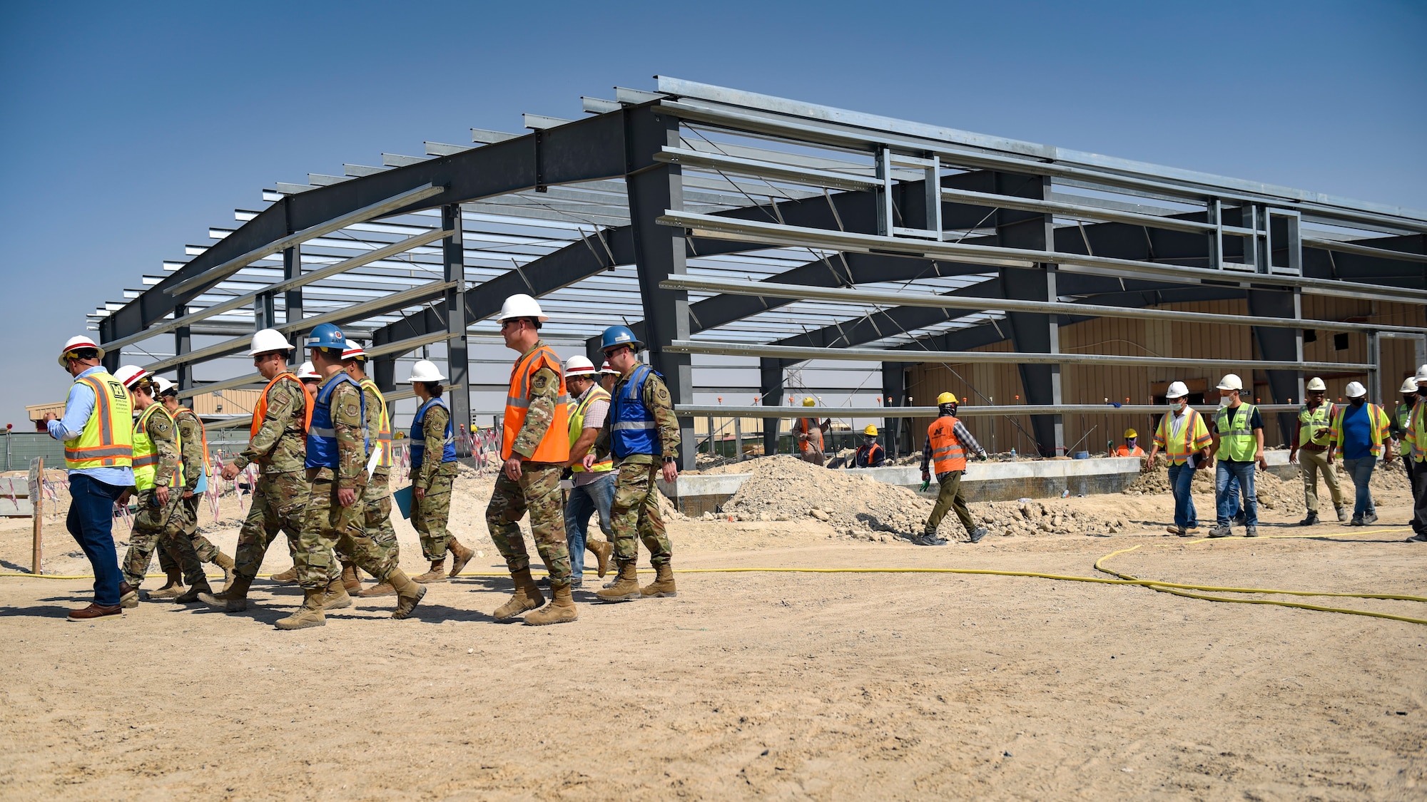 U.S. Army Maj. Gen. Kimberly Colloton, commanding general of the U.S. Army Corps of Engineers Transatlantic Division, takes a tour of the construction area of a new dining facility with Ali Al Salem Air Base leadership and USACE at ASAB, Kuwait, Oct. 21, 2021. It’s a priority of the 386th Air Expeditionary Wing to improve its installations and the quality of life of its Airmen. (U.S. Air Force photo by Staff Sgt. Ryan Brooks)