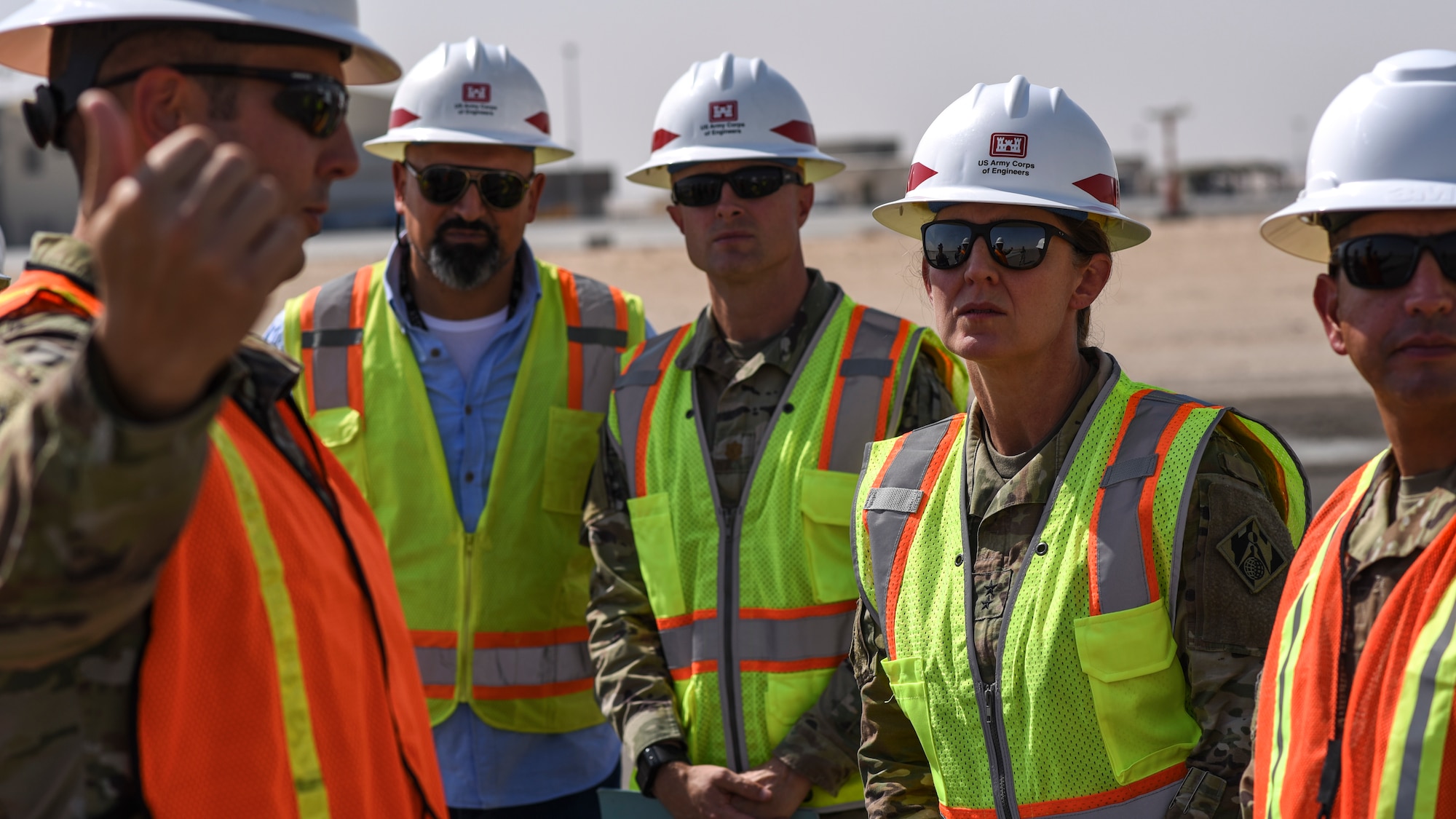 U.S. Army Maj. Gen. Kimberly Colloton, commanding general of the U.S. Army Corps of Engineers Transatlantic Division, speaks with Ali Al Salem Air Base leadership and USACE regarding the runway addition at ASAB, Kuwait, Oct. 21, 2021. The 386th Air Expeditionary Wing constantly improves its combat capabilities and readiness. (U.S. Air Force photo by Staff Sgt. Ryan Brooks)