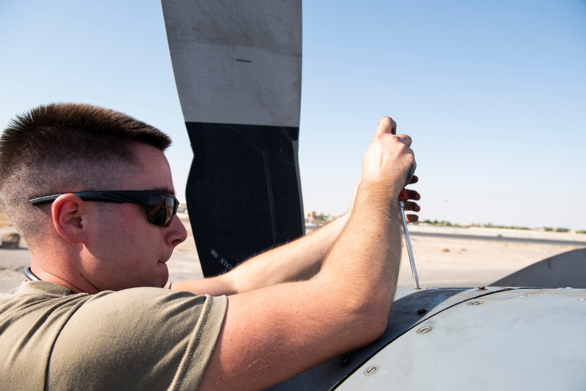 779th EAMU Airmen work on a C-130H Hercules