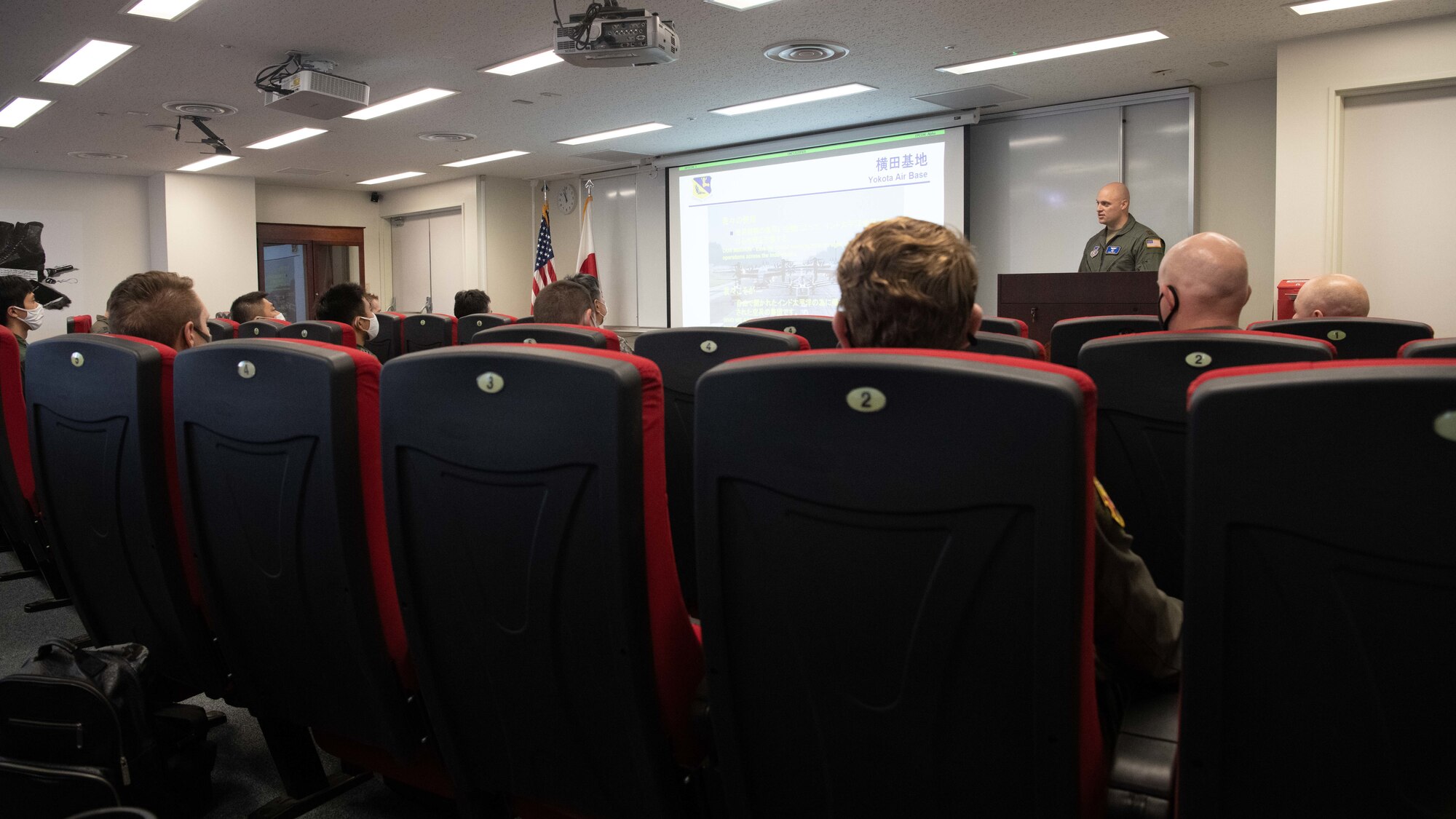 U.S. Air Force Maj. Chris Wolff, 374th Airlift Wing Air Force safety division lead, briefs U.S. Air Force and Koku-Jieitai (Japan Air Self-Defense Force) Airmen
