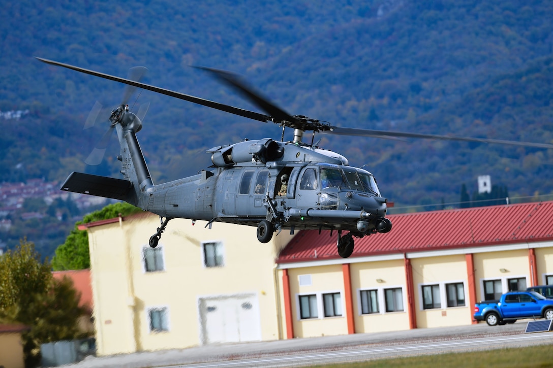 A U.S. Air Force HH-60G Pave Hawk helicopter operated by the 56th Rescue Squadron takes flight during Fighting Wyvern, a base defense exercise at Aviano Air Base, Italy, Nov. 4, 2021. During the exercise, members of the 31st Operations Group executed search and recovery operations in a simulated downed aircraft scenario. (U.S. Air Force photo by Senior Airman Thomas S. Keisler IV)