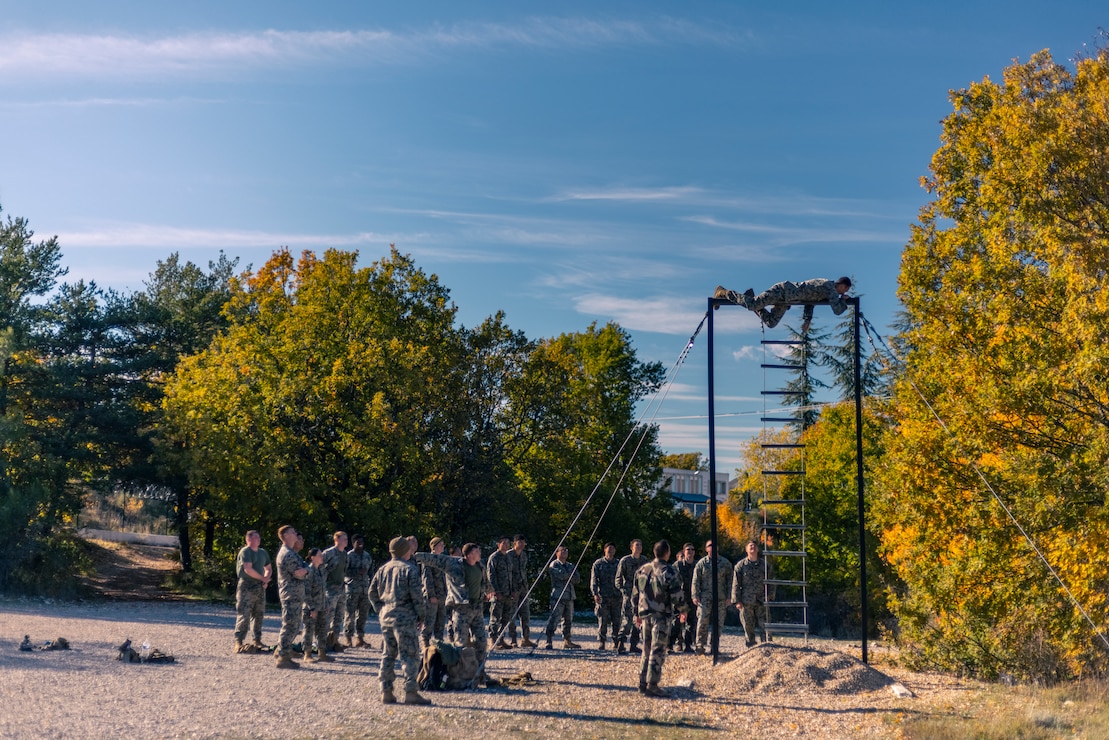 U.S. Marines from 10th Marine Regiment, 2d Marine Division, complete the French Marine obstacle course during a bilateral visit with the 3rd Regiment D'Artillerie De Marine, near Montferrat, France, Nov. 2, 2021. During the 3-week bilateral visit, U.S. and French Marines bolstered relationships and increased interoperability between the forces through field artillery and amphibious training events. (U.S. Marine Corps photo by Staff Sgt. Akeel Austin)