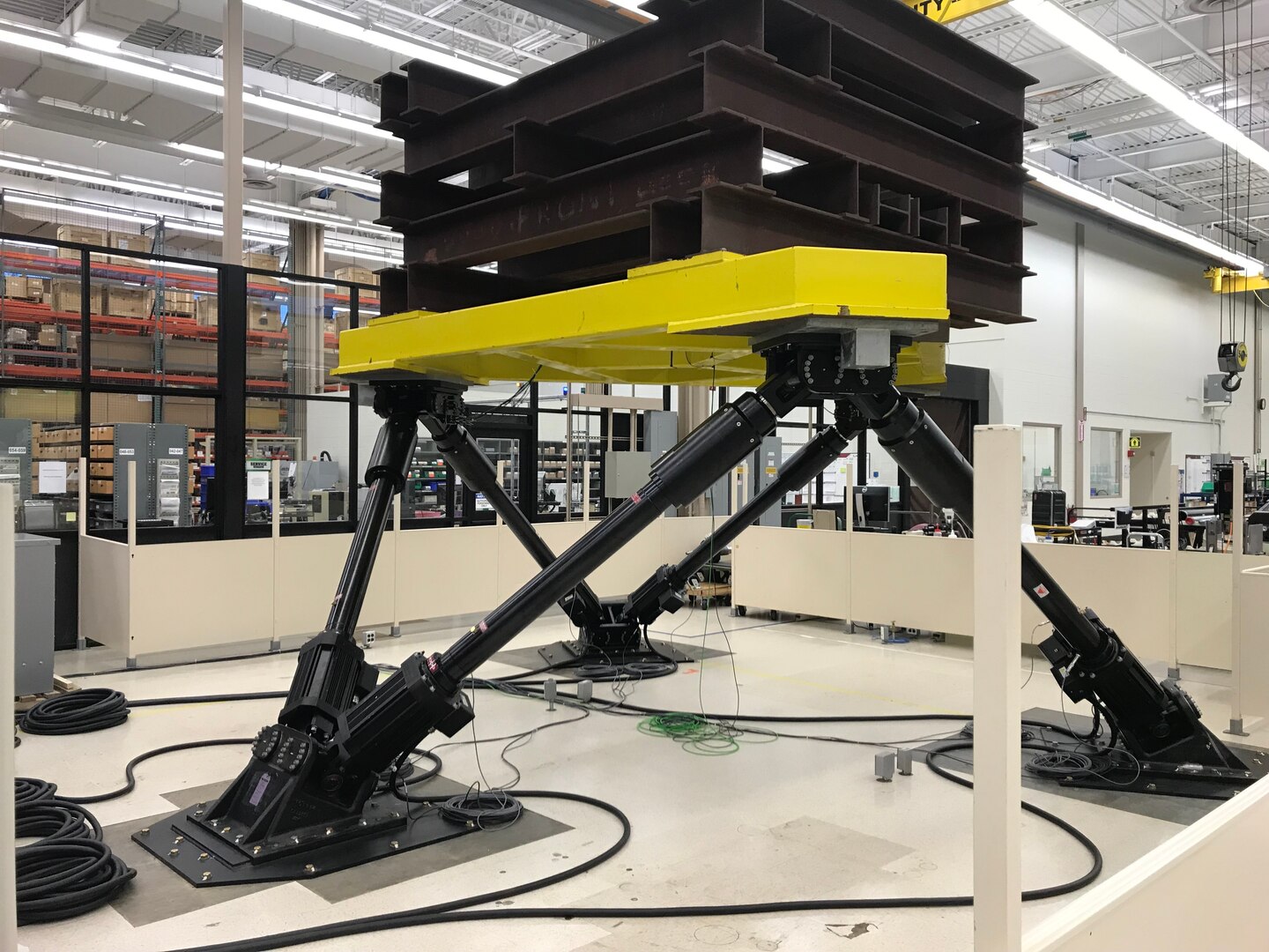 IMAGE: Commercial motion base typically used for flight simulators and theme park rides. Engineers at NSWCDD adapted the base to simulate ship movement environments for use in testing durability and function of weapons capabilities.