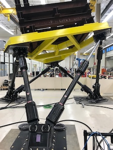 IMAGE: Commercial motion base typically used for flight simulators and theme park rides. Engineers at NSWCDD adapted the base to simulate ship movement environments for use in testing durability and function of weapons capabilities.