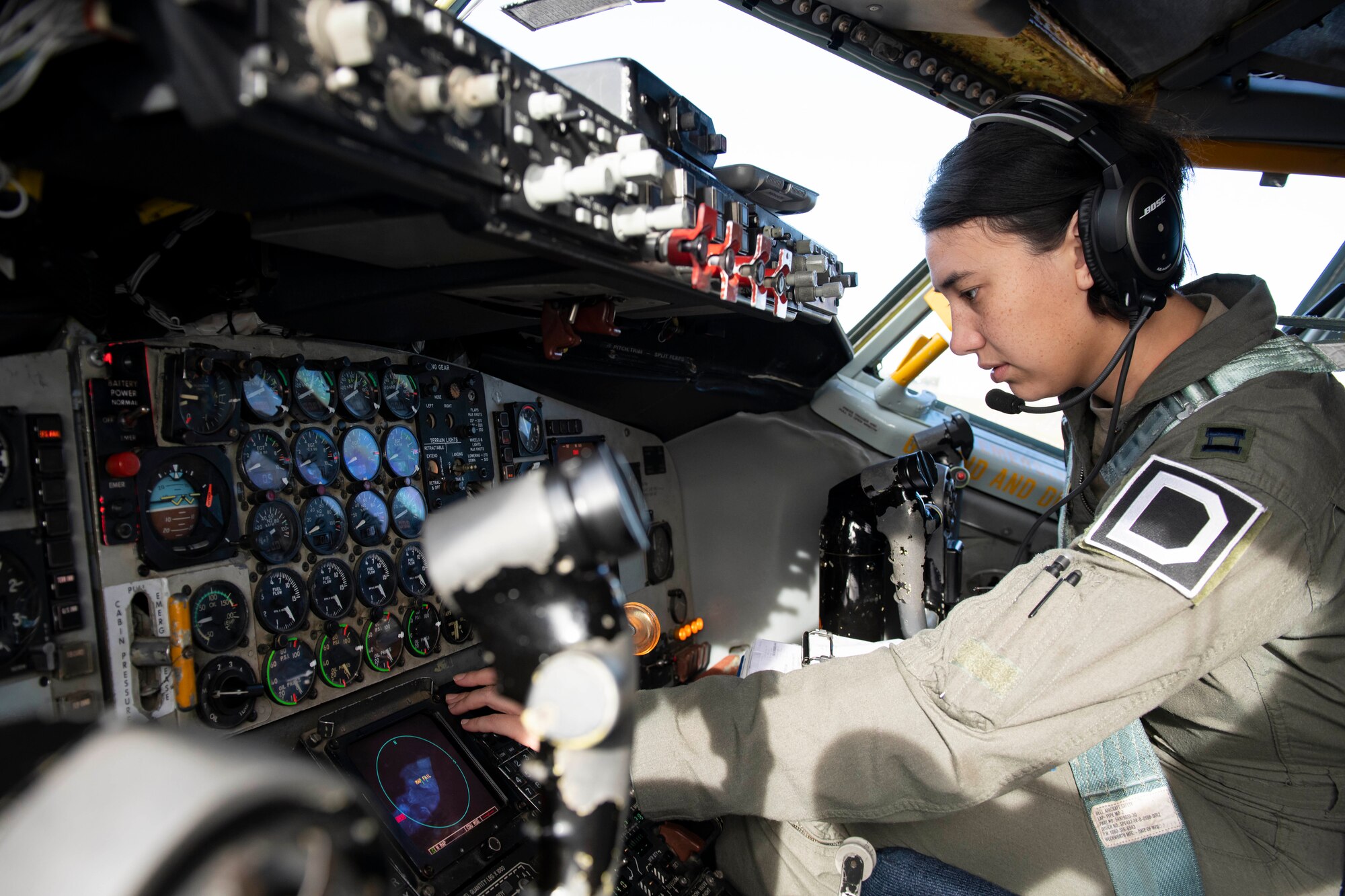 U.S. Air Force Capt. Katharine Kopinski, 351st Air Refueling Squadron pilot, completes preflight in a KC-135 Stratotanker aircraft at Royal Air Force Fairford, England, Nov. 2, 2021. Airmen from the 100th Air Refueling Wing conducted operations out of RAFF as part of an Agile Combat Employment exercise. Utilizing ACE concepts ensures that U.S. forces in Europe are better equipped to operate from locations with varying levels of capacity and support to accomplish the mission. This further ensures Airmen and aircrews are postured to deliver lethal combat power across the full spectrum of military operations. (U.S. Air Force photo by Senior Airman Jennifer Zima)