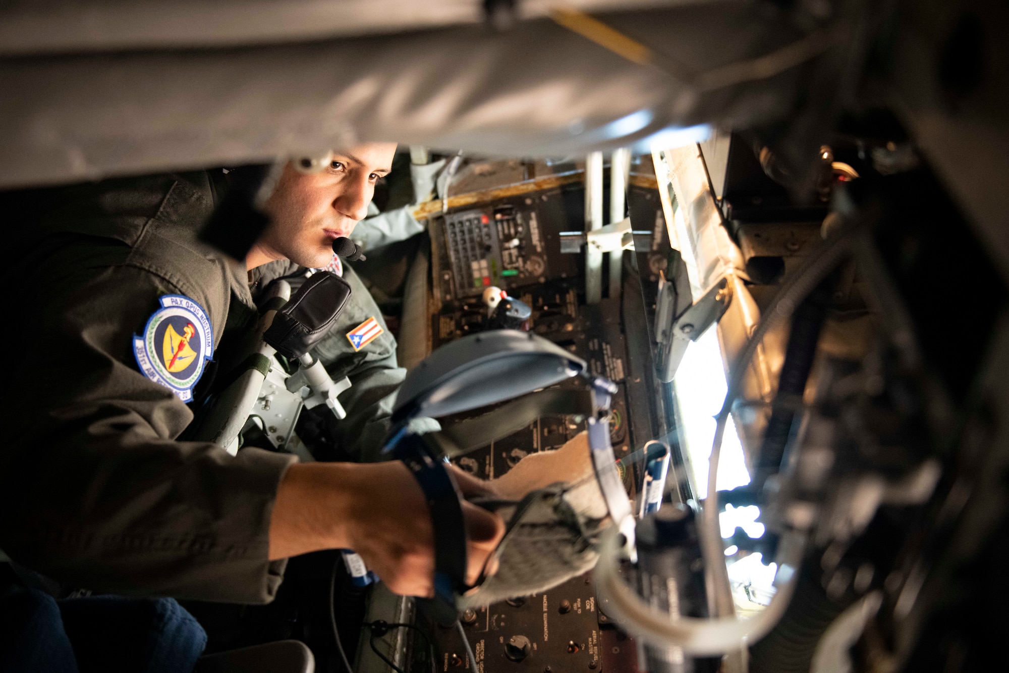 U.S. Air Force Staff Sgt. Juan Morales, 351st Air Refueling Squadron boom operator, inspect a KC-135 Stratotanker aircraft before a flight at Royal Air Force Fairford, England, Nov. 2, 2021. Airmen from the 100th Air Refueling Wing conducted operations out of RAFF as part of an Agile Combat Employment exercise. Utilizing ACE concepts ensures that U.S. forces in Europe are better equipped to operate from locations with varying levels of capacity and support to accomplish the mission. This further ensures Airmen and aircrews are postured to deliver lethal combat power across the full spectrum of military operations. (U.S. Air Force photo by Senior Airman Jennifer Zima)