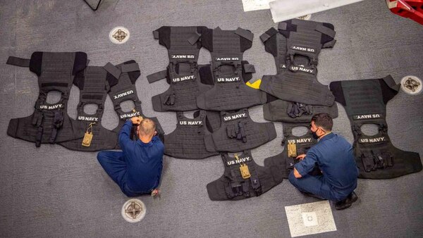 USS Charleston Sailors Conduct Perodic Maintenance Check