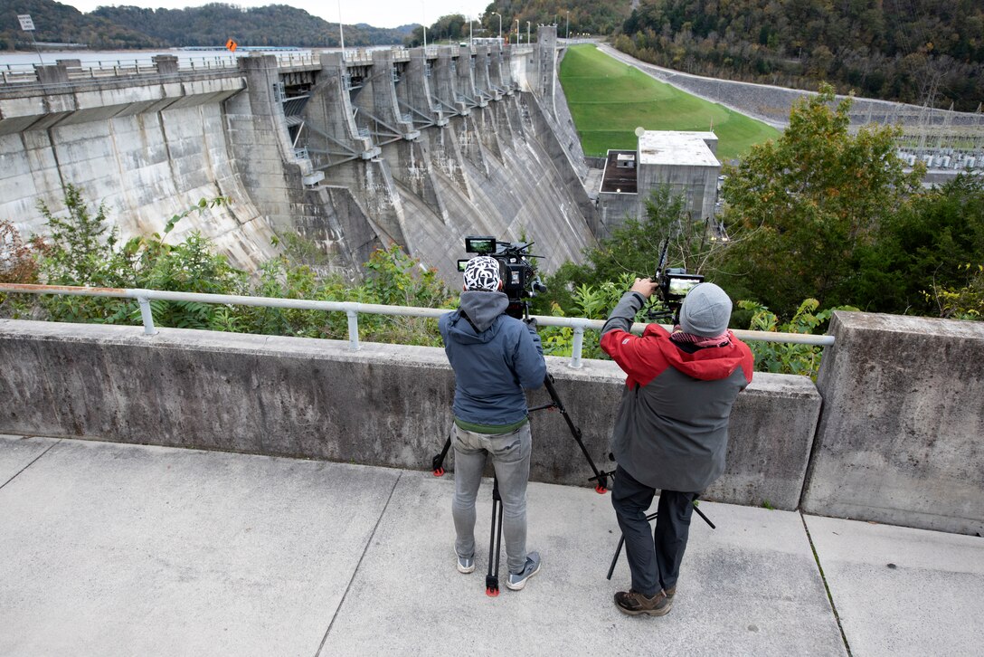 Director Zebediah Smith (Left) and First Assistant Camera Barrett Dennison with Open Jaw Productions captures video Nov. 3, 2021 of Center Hill Dam on the Caney Fork River in Lancaster, Tennessee, for a U.S. Army Corps of Engineers National Inventory of Dams video production. (USACE Photo by Lee Roberts)