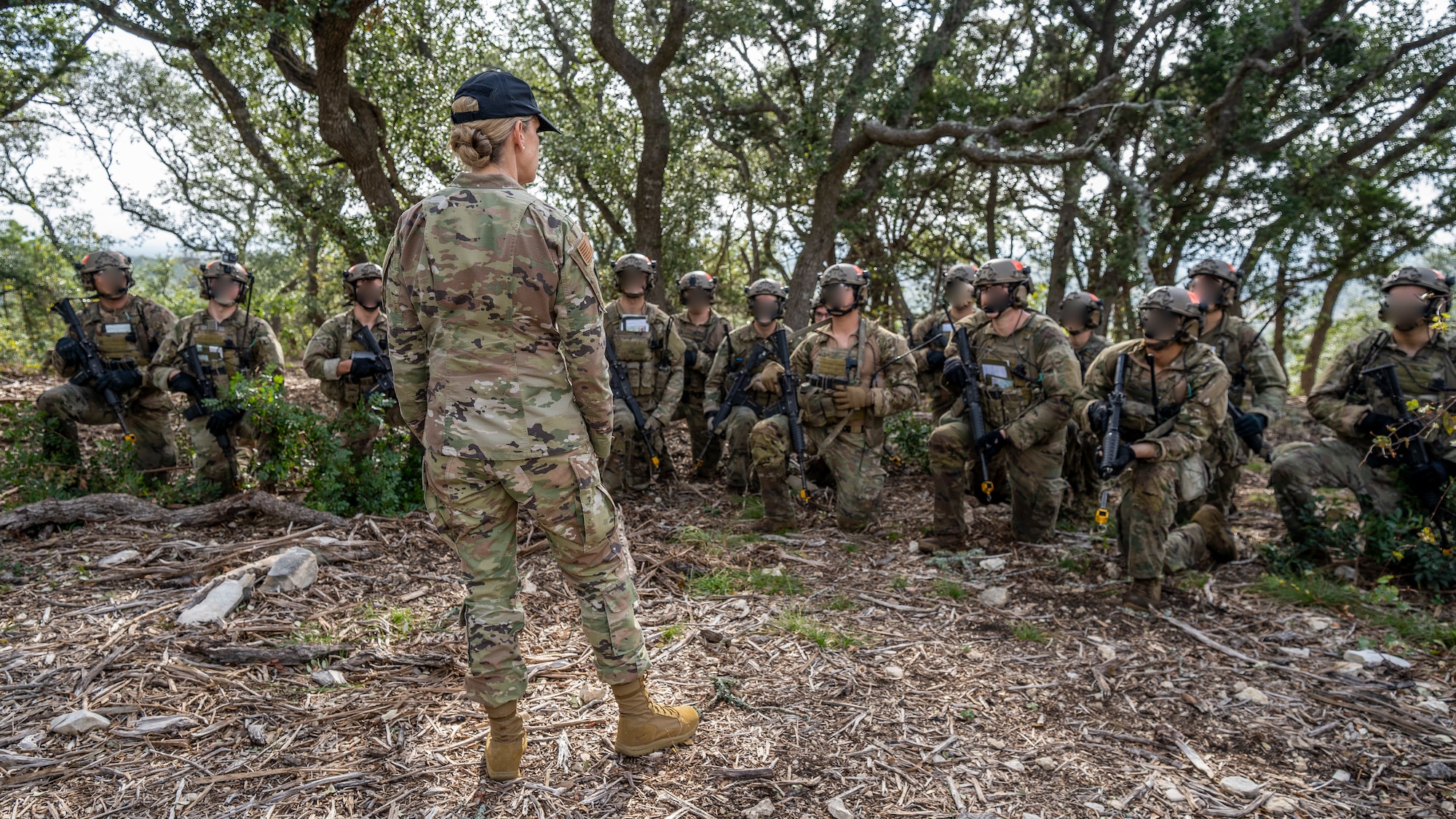 U.S. Air Force Maj. Gen. Michele Edmondson, speaks with Tactical Air Control Party students from the 353rd Special Warfare Training Squadron during a training exercise at Joint Base San Antonio-Camp Bullis, Nov. 2, 2021.