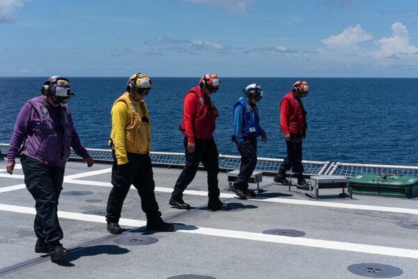 USS Jackson (LCS 6) Sailors Perform FOD Walkdown