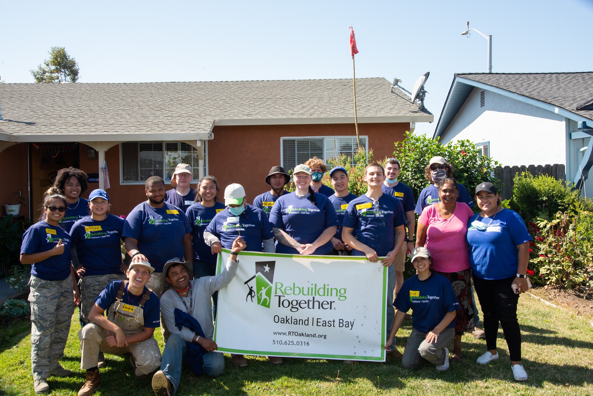 A group of 19 Reserve and active duty Airmen from the 349th Air Mobility Wing and 60th AMW volunteered  in early October to help a low-income family in Hayward with a home rehabilitation project. (Courtesy photo by Senior Airman Gregory Barlow, Jr.)